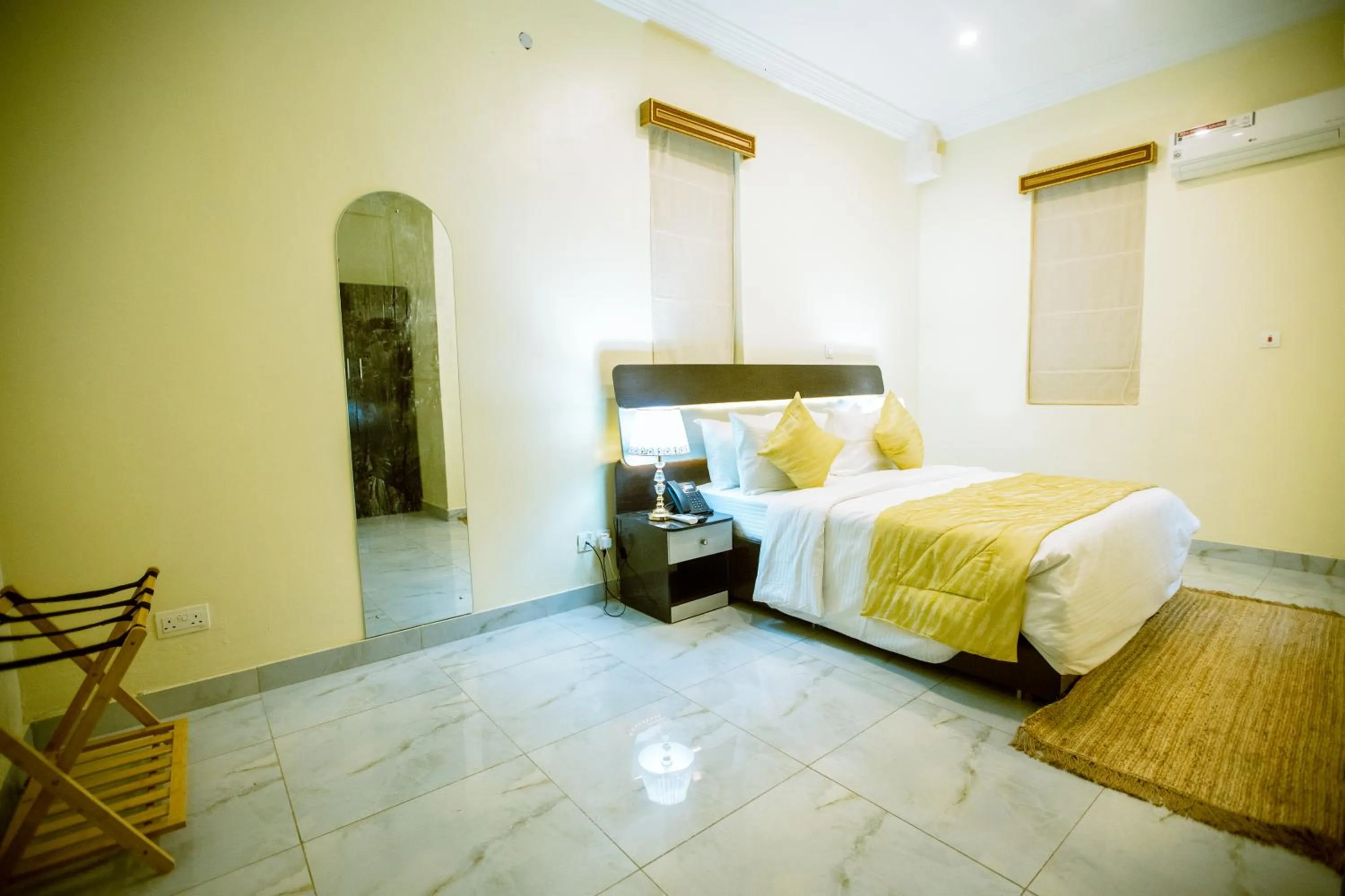 Bed in Providha Hotel & Suites