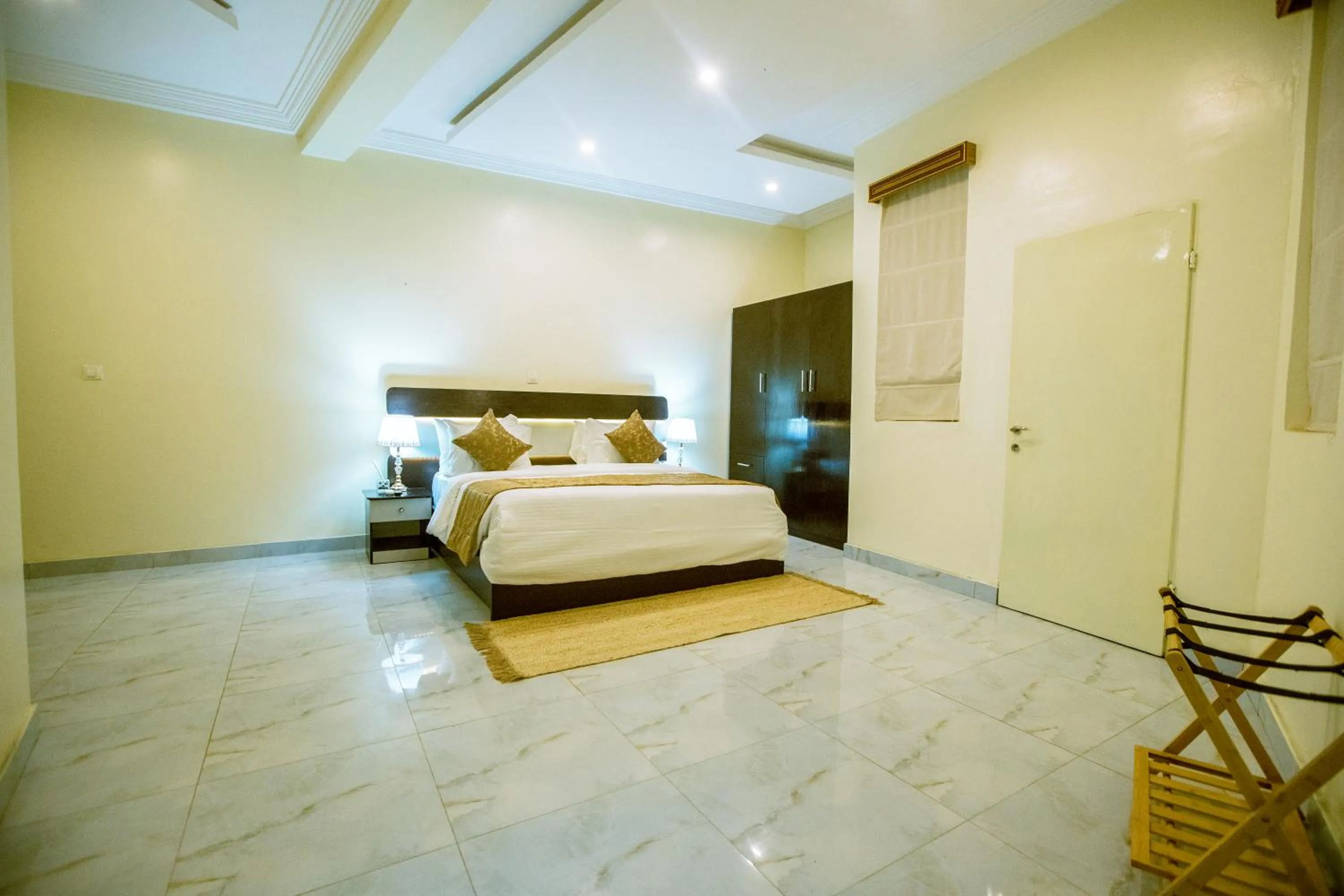 Bed in Providha Hotel & Suites