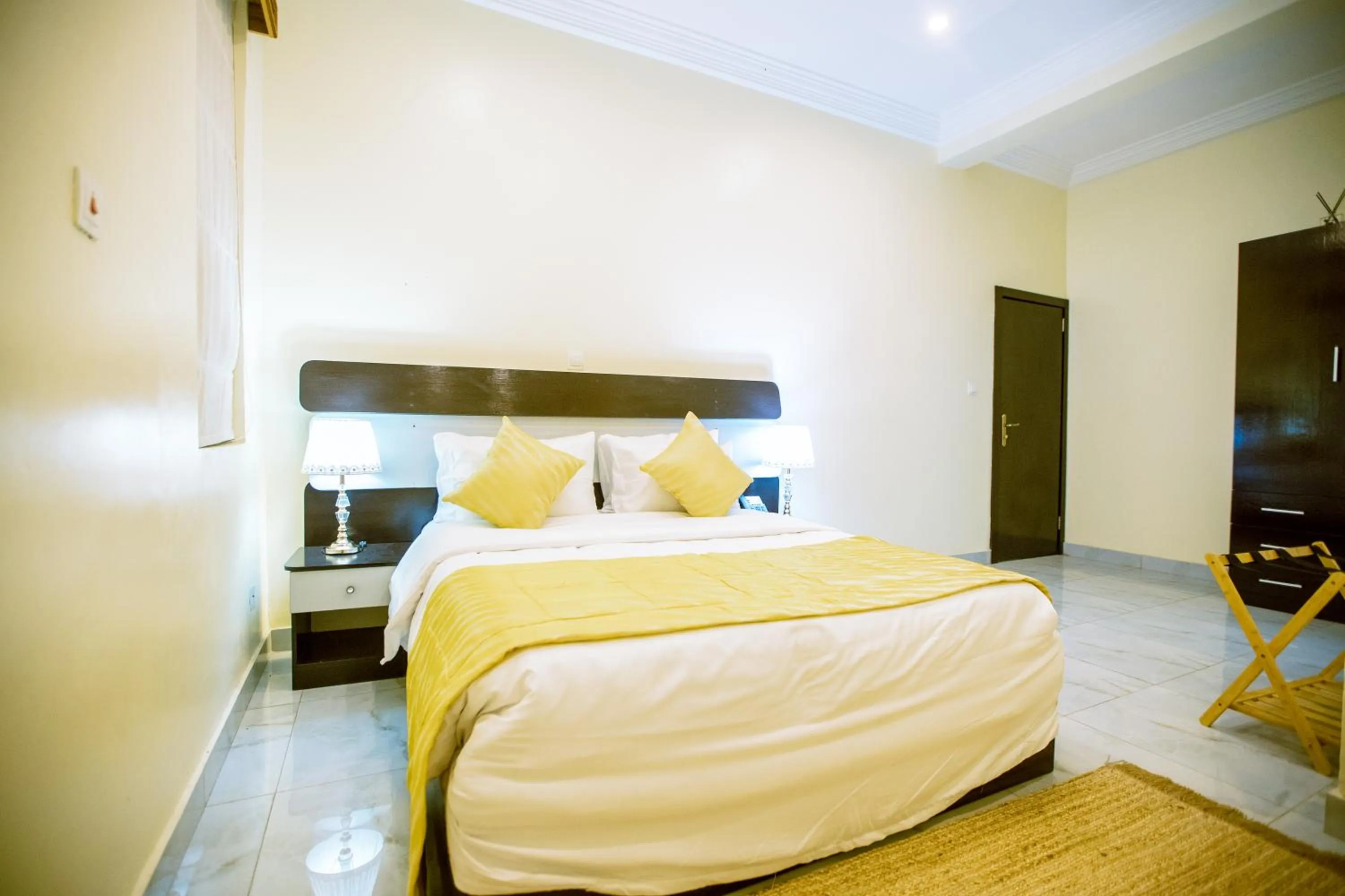 Bed in Providha Hotel & Suites