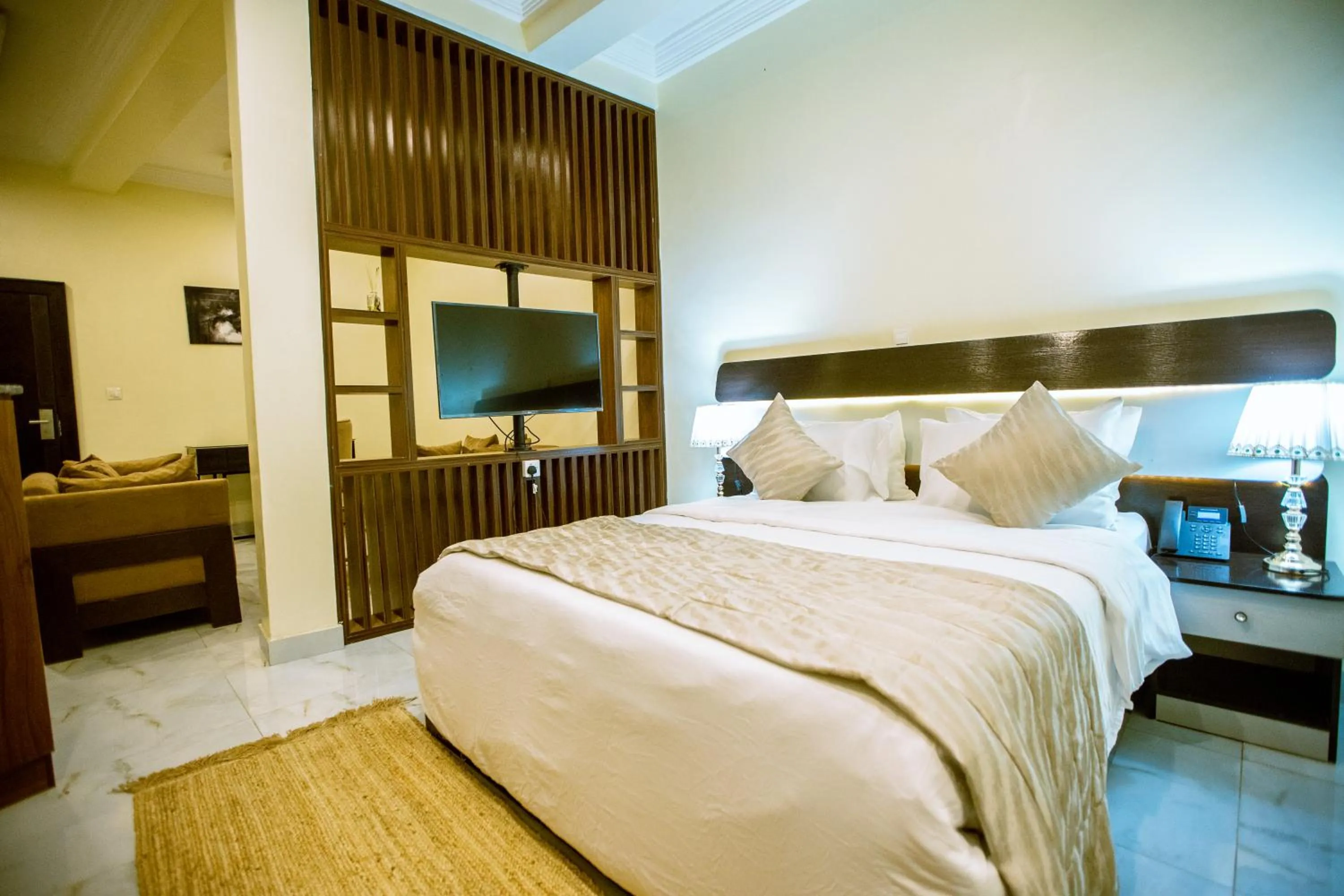Bed in Providha Hotel & Suites