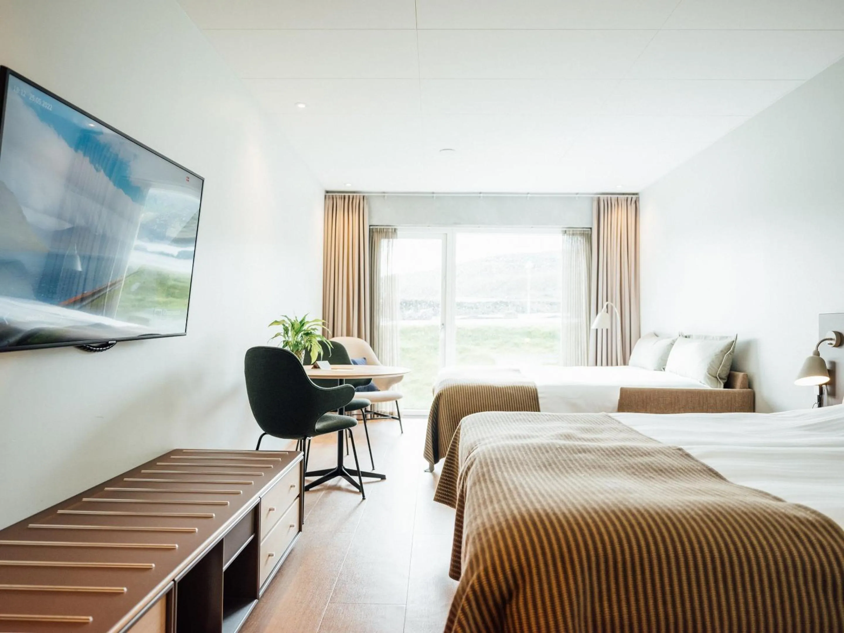 Photo of the whole room, Bed in Hotel Føroyar