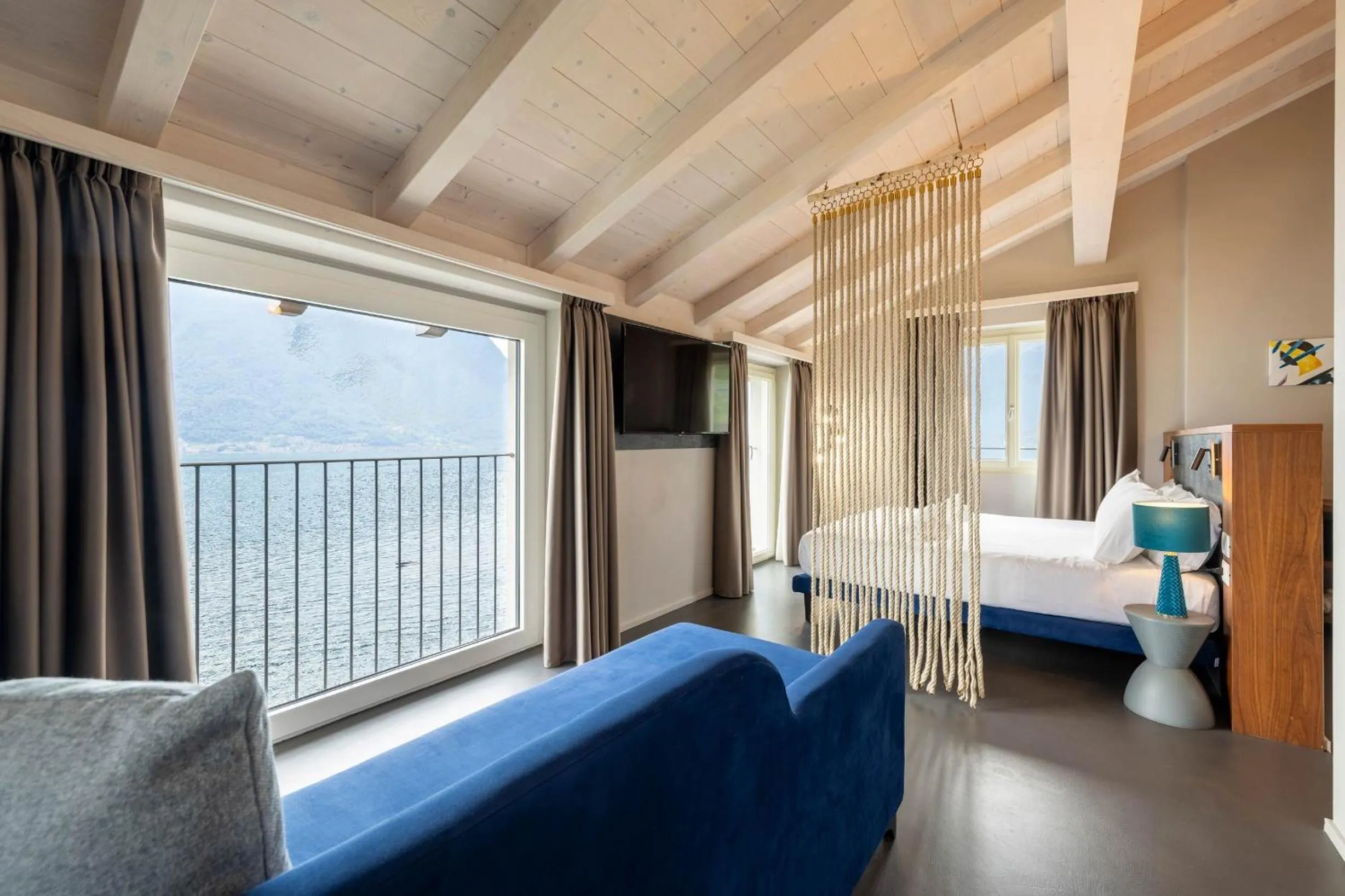 Communal lounge/ TV room, Bed in Villa Clementina Boutique Hotel