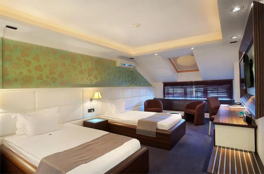 Photo of the whole room, Bed in Garni Hotel Crystal