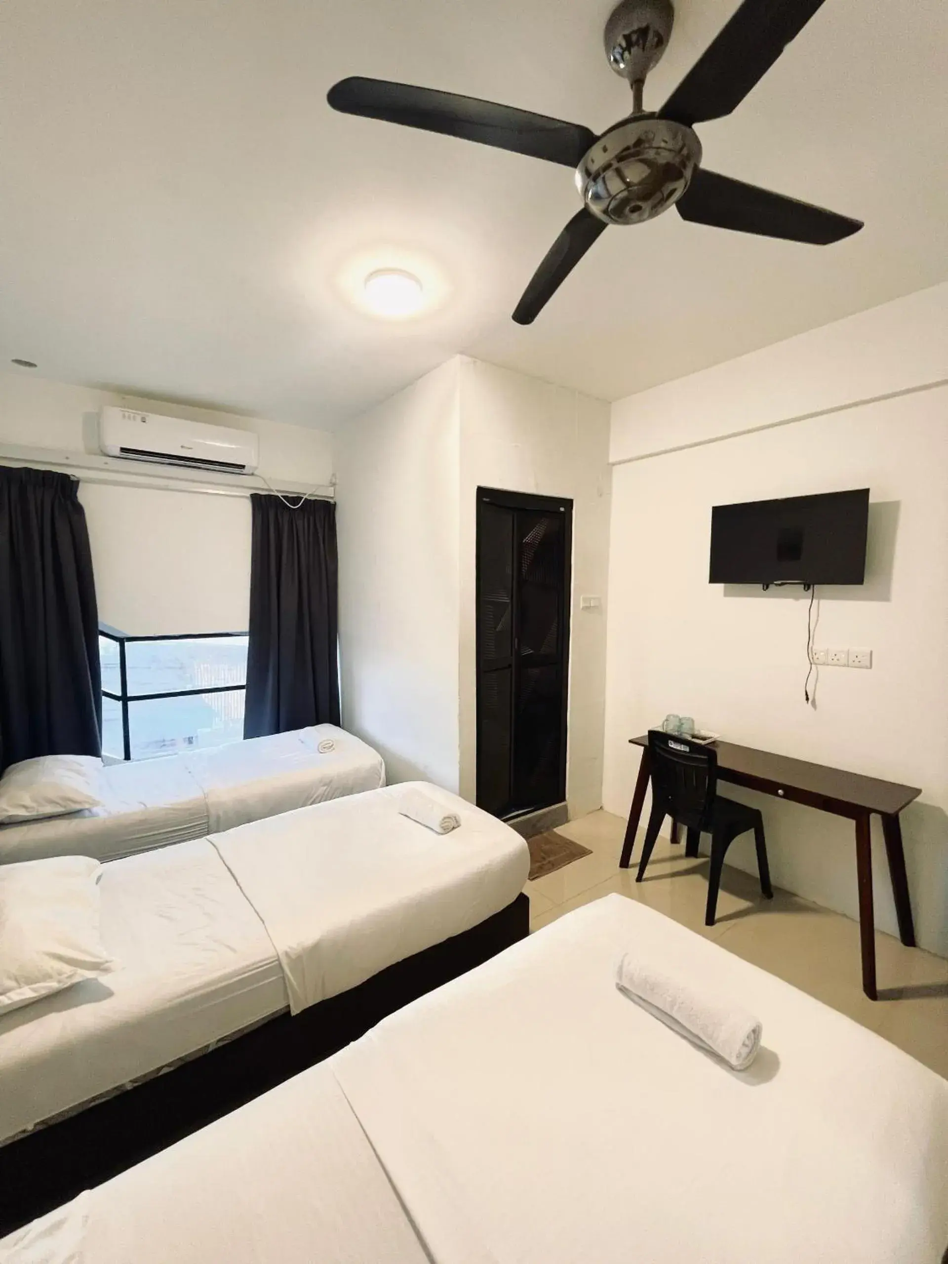 Standard Triple Room in Hotel Casaria Standard Triple Room in Hotel Casaria