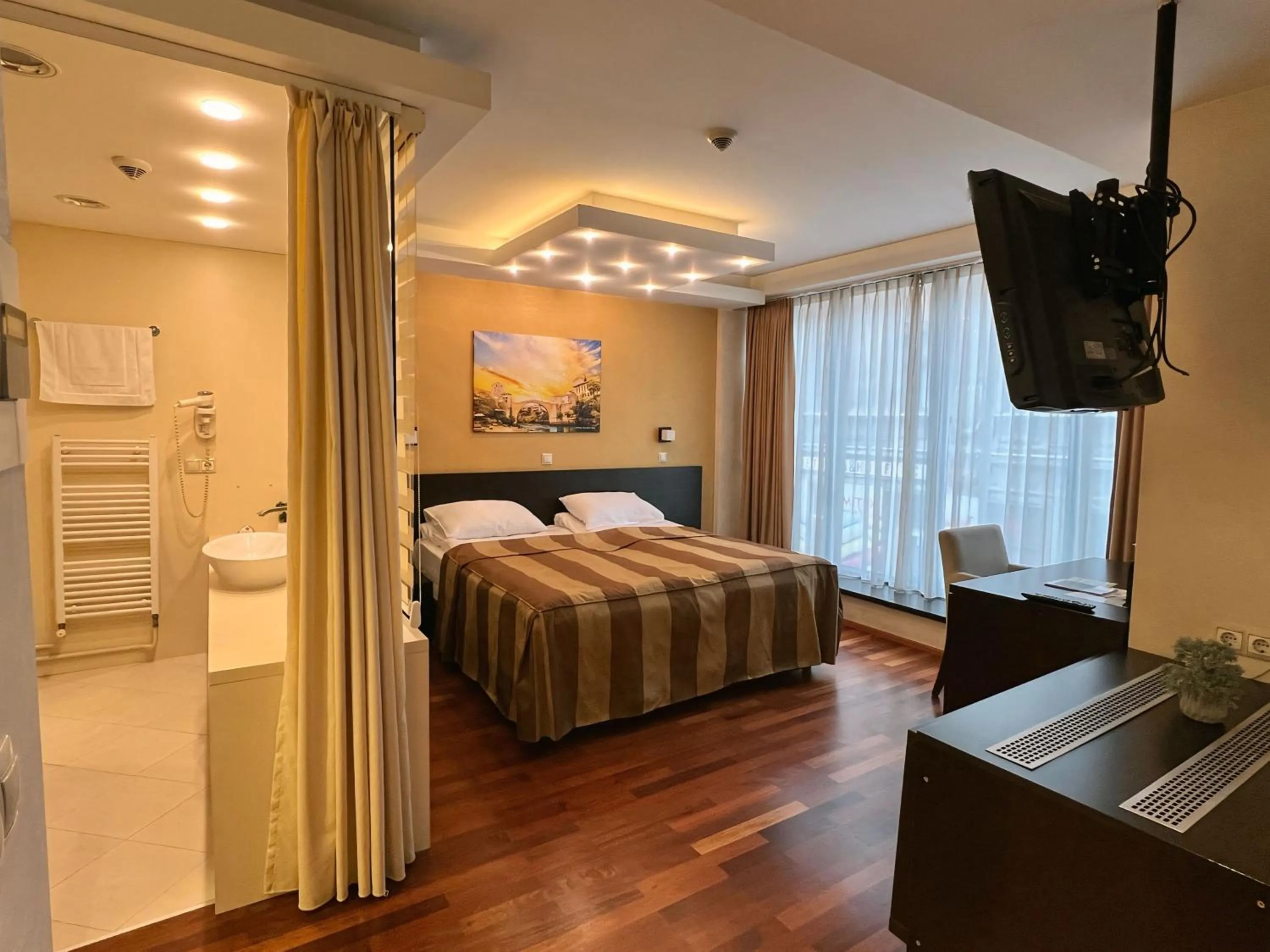 Photo of the whole room, Bed in City Boutique Hotel