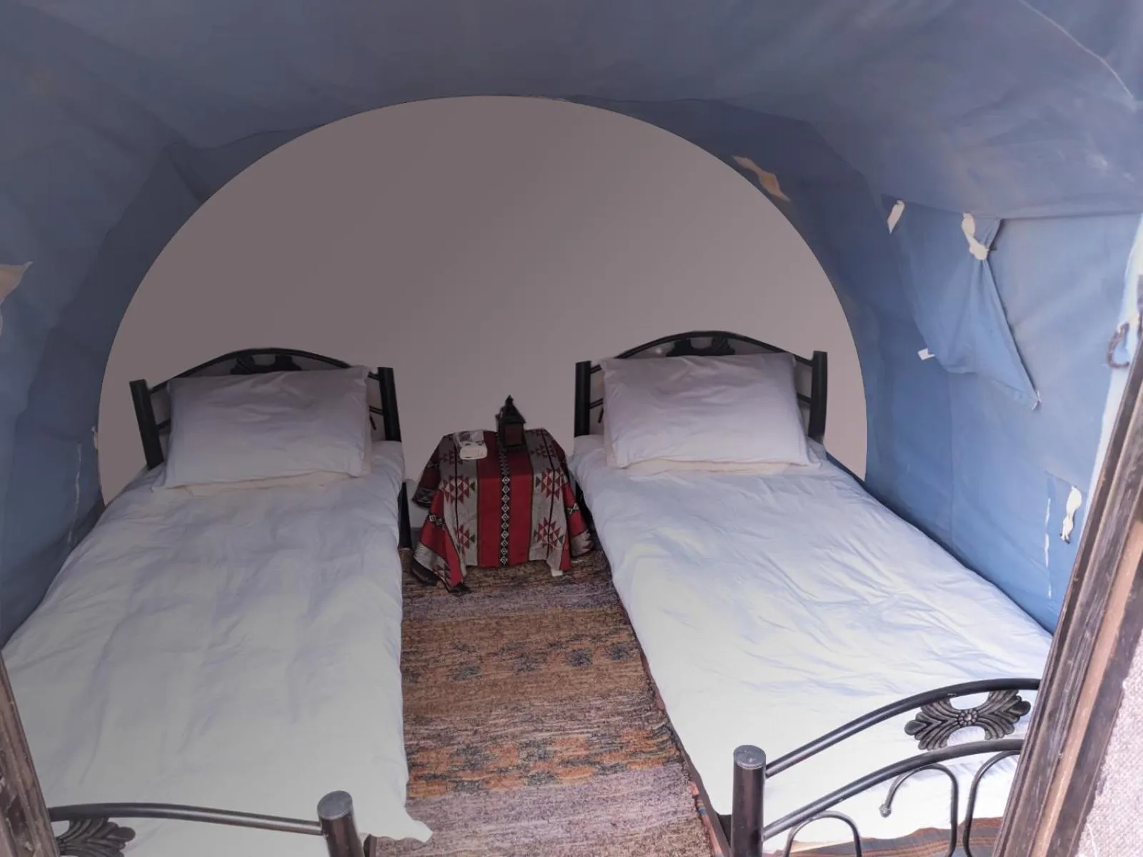 Bed in Wadi Rum Majestic Camp