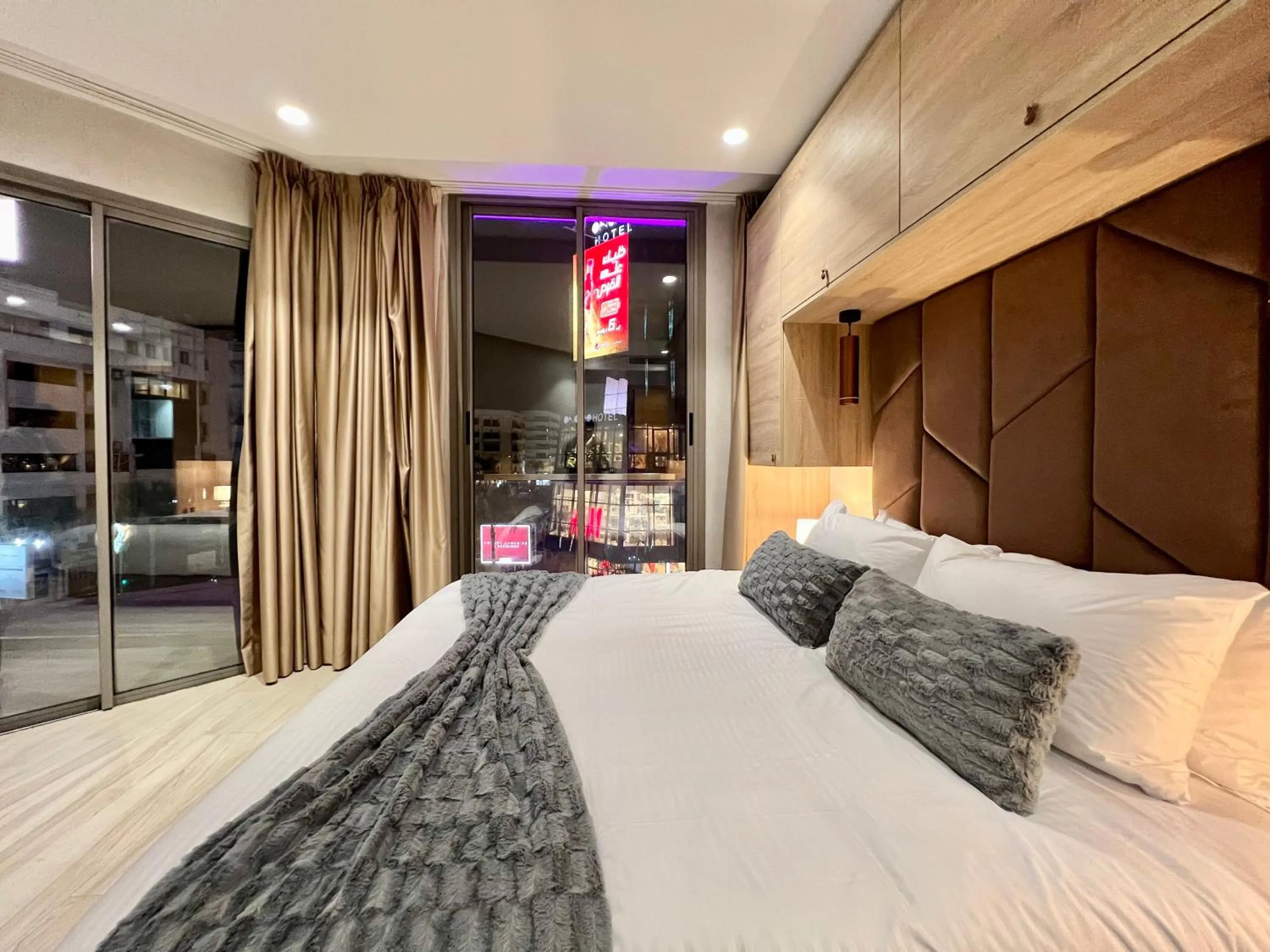 Bed in ZEN Suites Hotel Massira