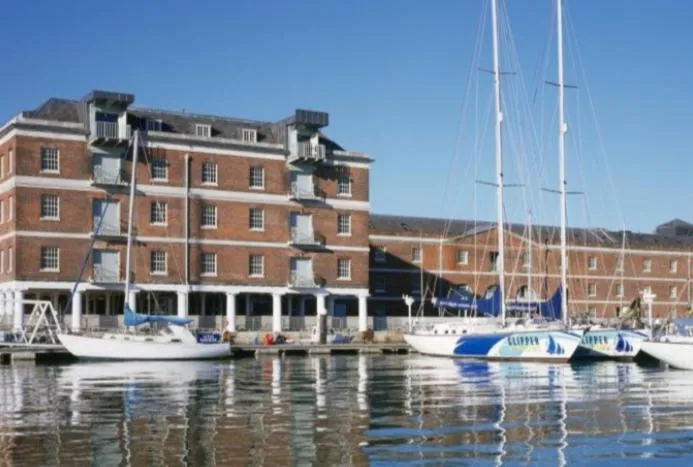 Property building in Beautiful Marina Apartment with private garden, flexible bedrooms with zip & link beds