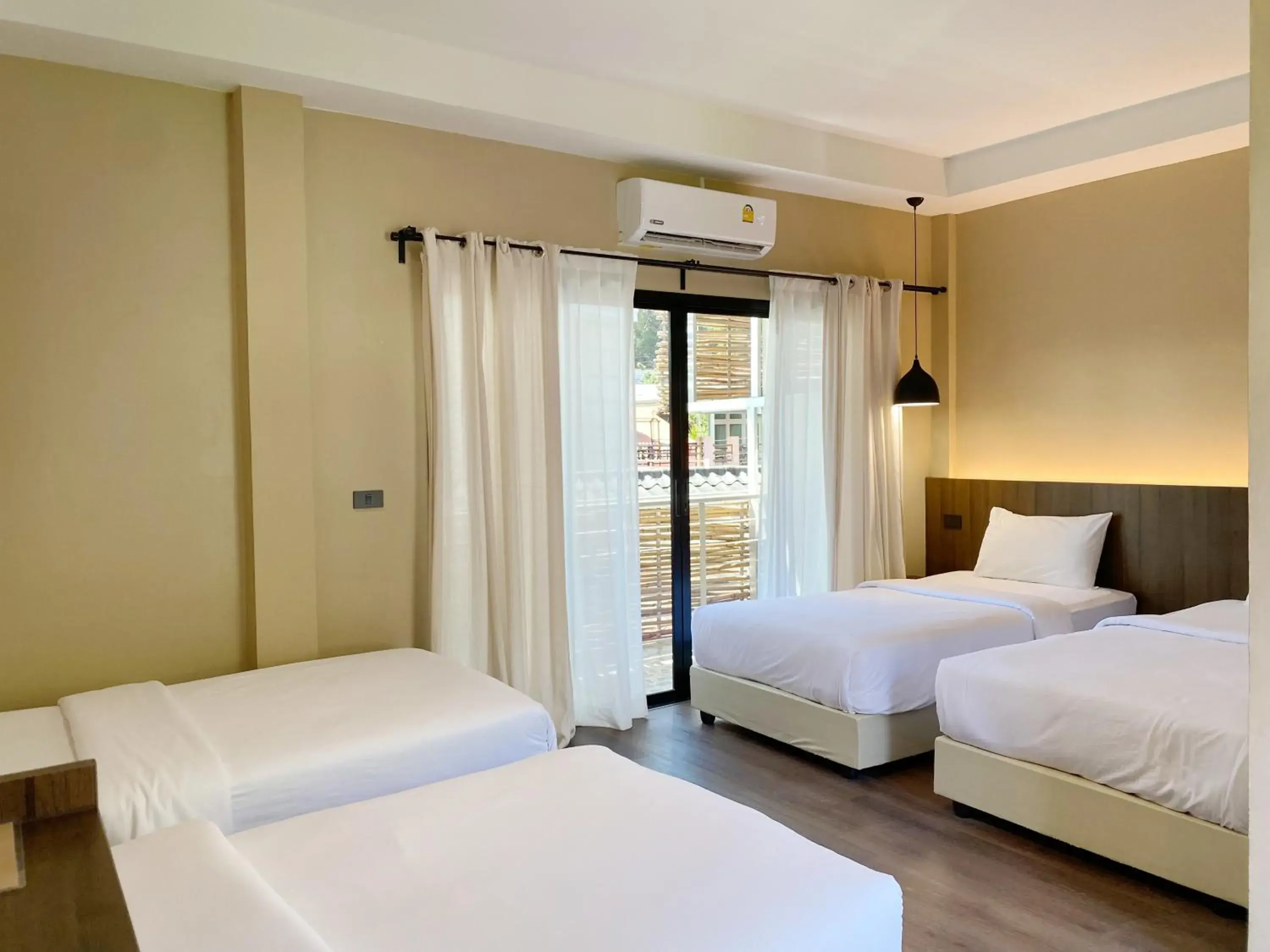 Triple Room with Balcony in Suncloud Hotel Koh Samet Triple Room with Balcony in Suncloud Hotel Koh Samet