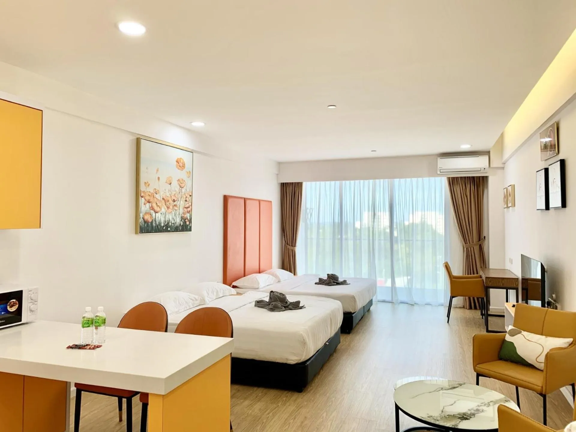 Living room, Bed in Deco Home @ Aru Suites