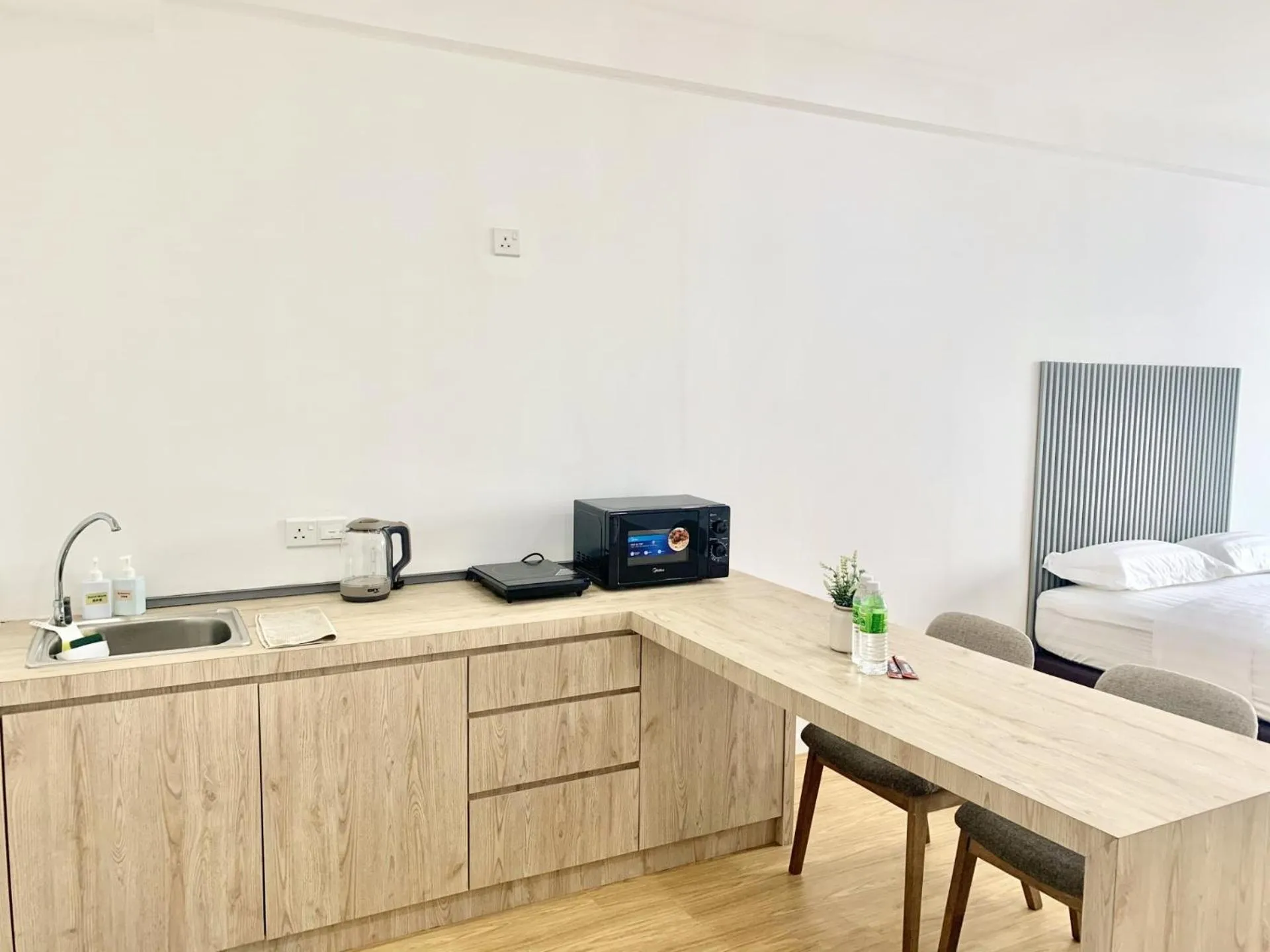 Kitchen or kitchenette in Deco Home @ Aru Suites