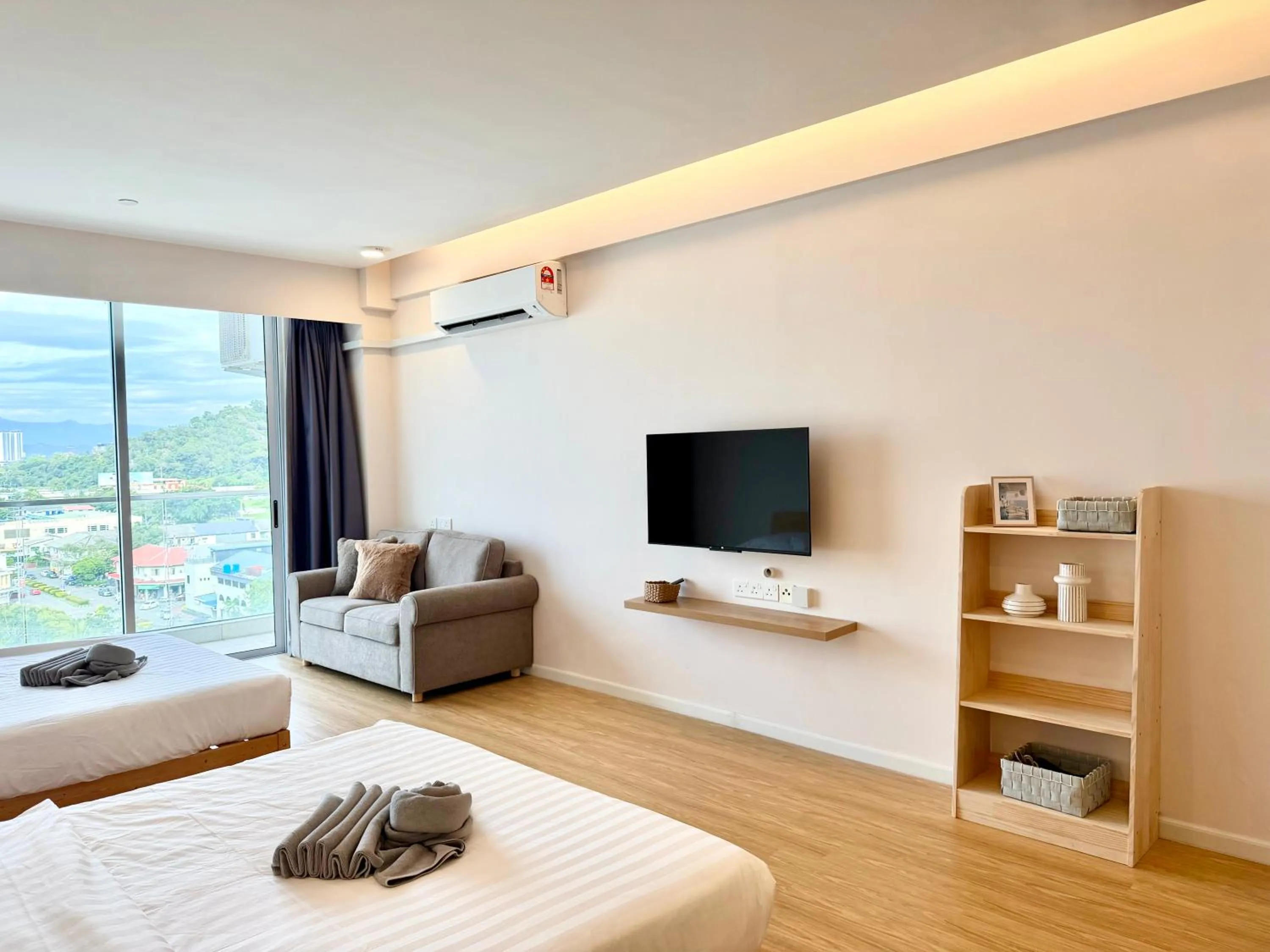 Living room, Bed in Deco Home @ Aru Suites