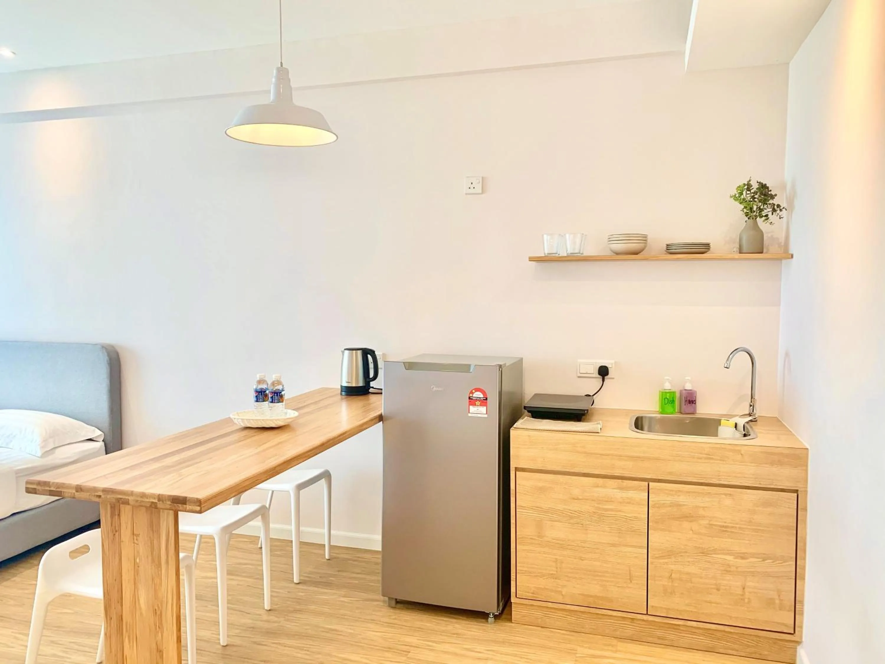 Kitchen or kitchenette in Deco Home @ Aru Suites