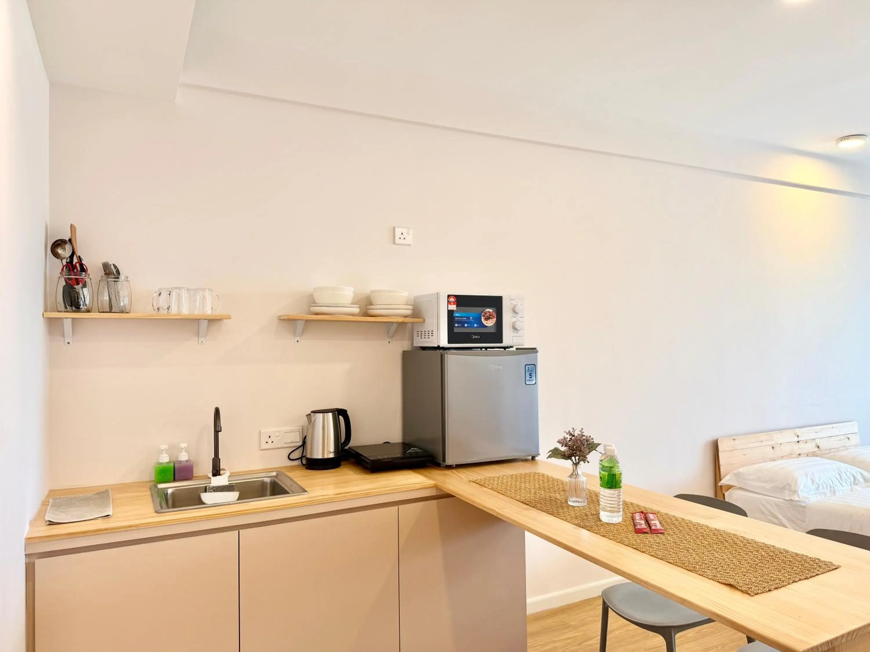 Kitchen or kitchenette in Deco Home @ Aru Suites