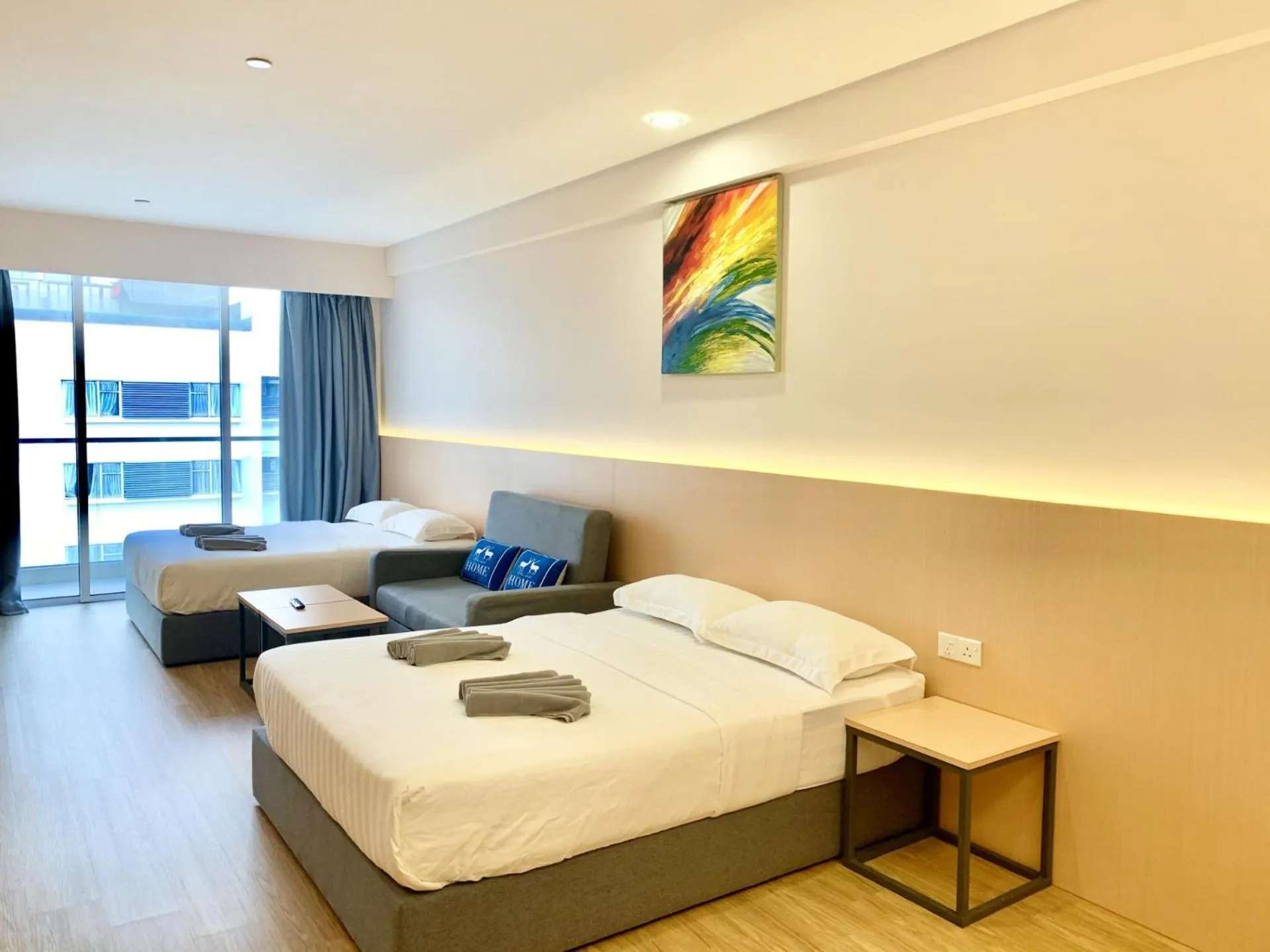 Living room, Bed in Deco Home @ Aru Suites