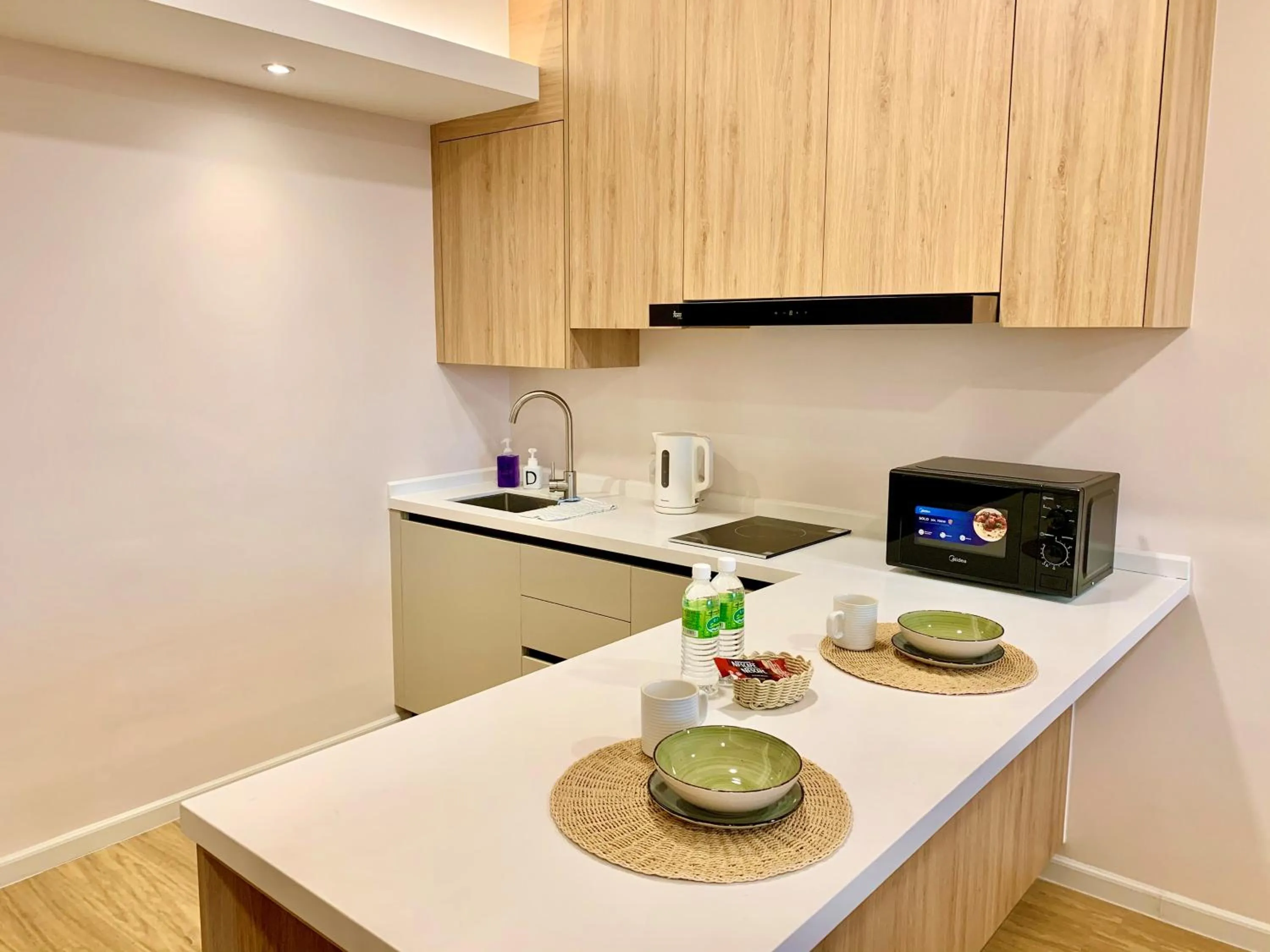 Kitchen or kitchenette in Deco Home @ Aru Suites