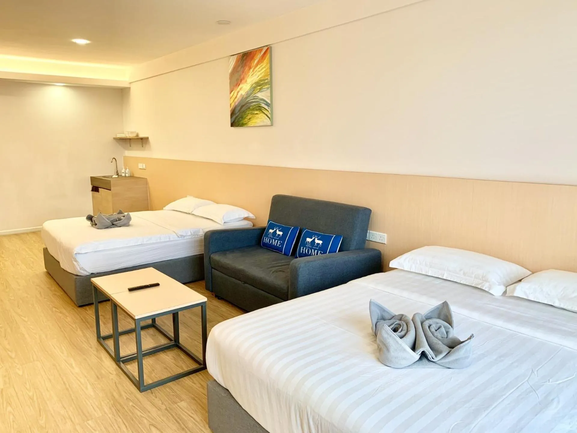 Living room, Bed in Deco Home @ Aru Suites