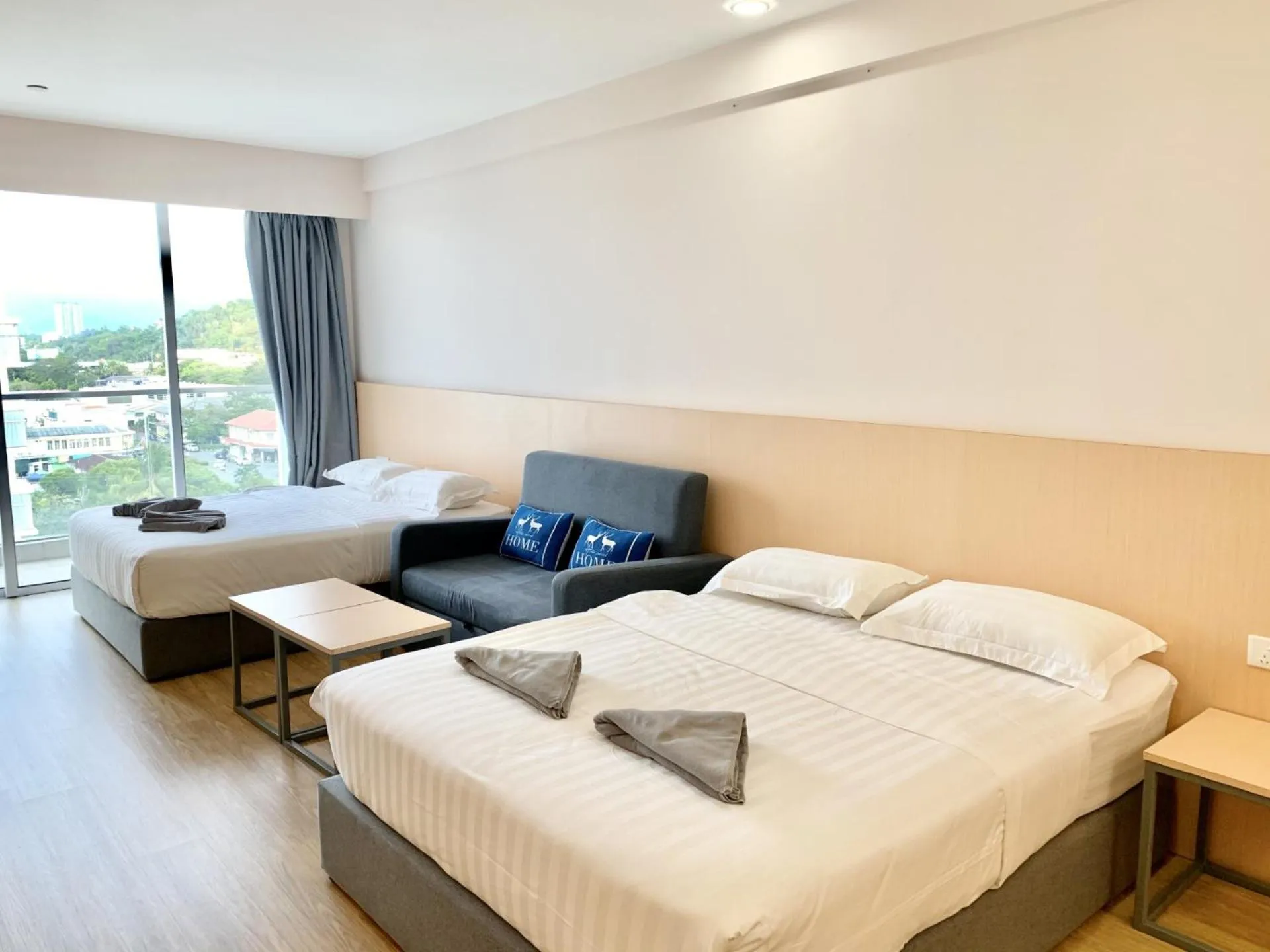 Living room, Bed in Deco Home @ Aru Suites