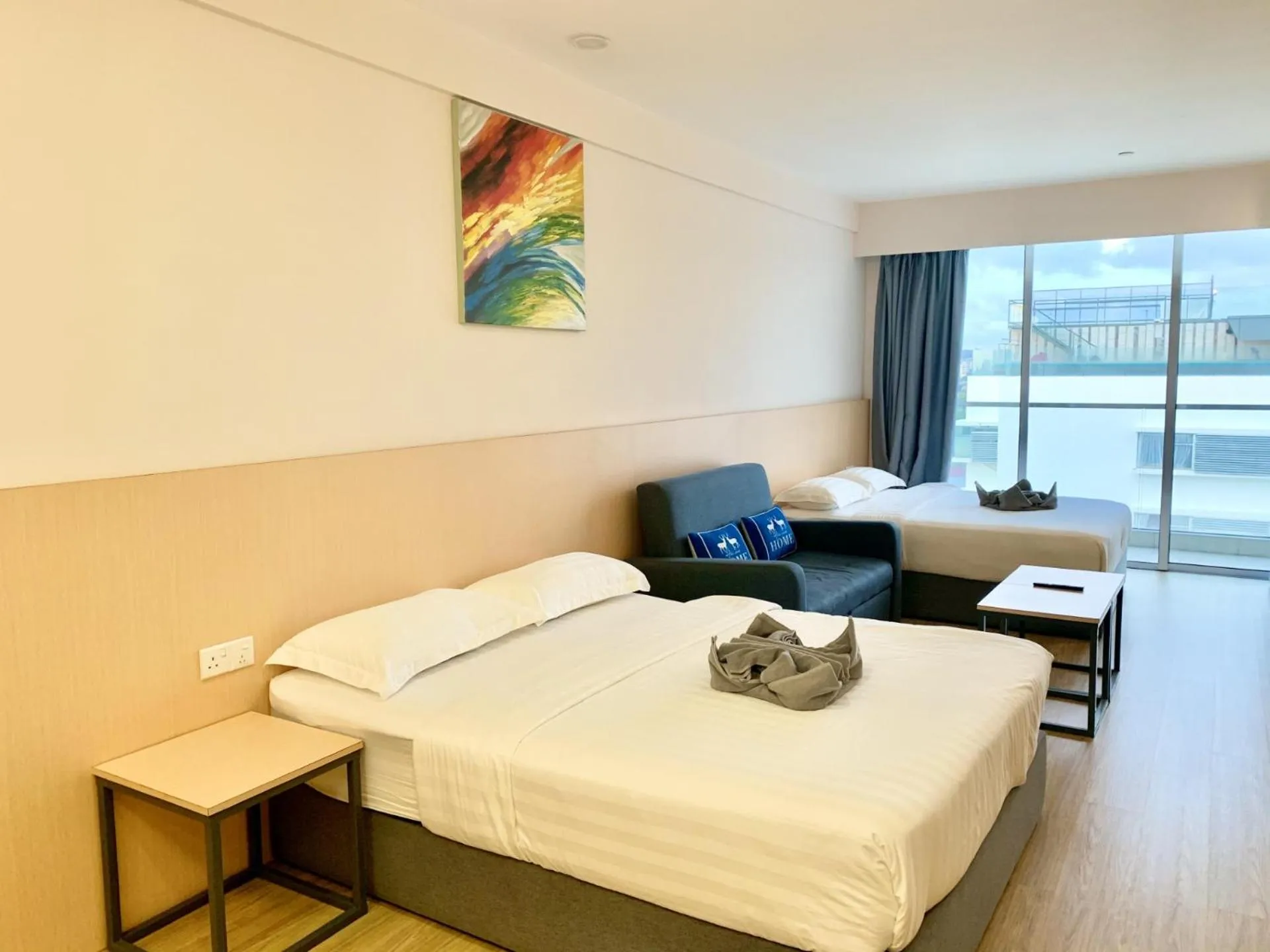 Living room, Bed in Deco Home @ Aru Suites