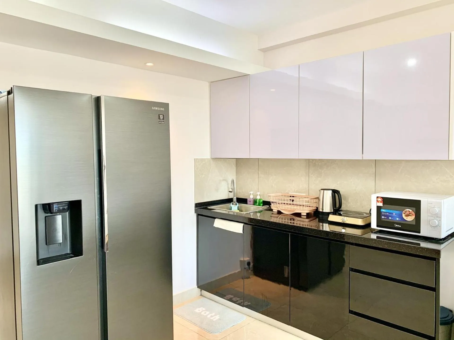 Kitchen or kitchenette in Deco Home @ Aru Suites