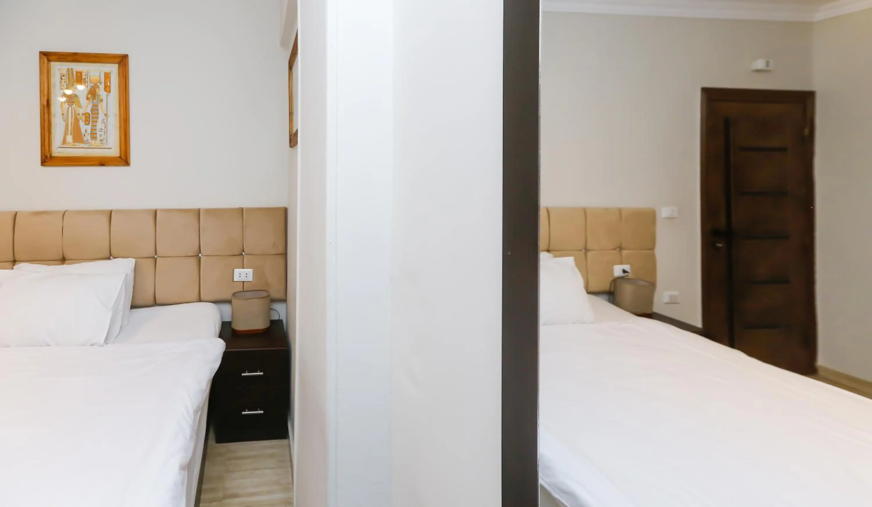 Bed in Crowne Pyramids View inn