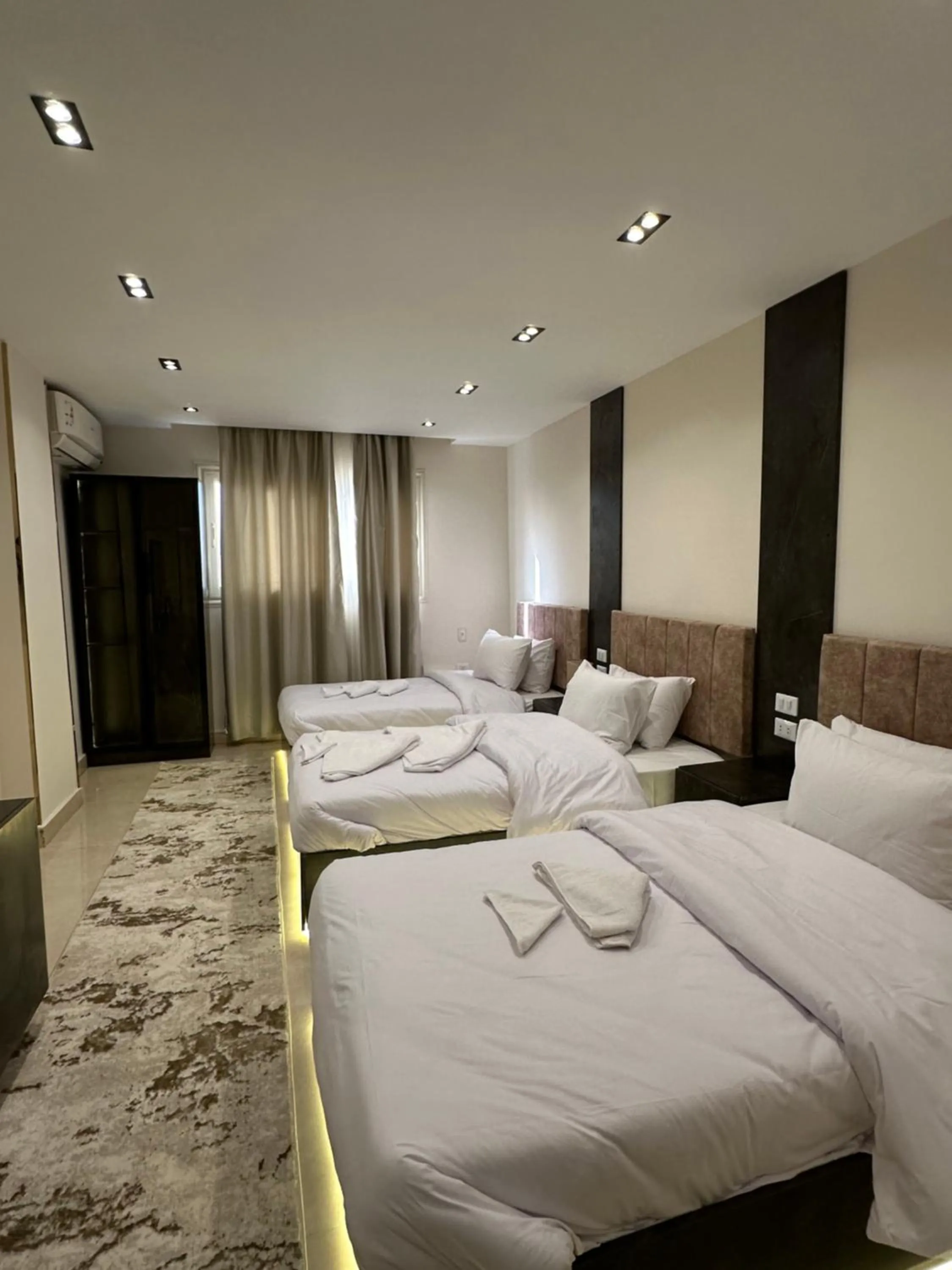 Bed in Crowne Pyramids View inn