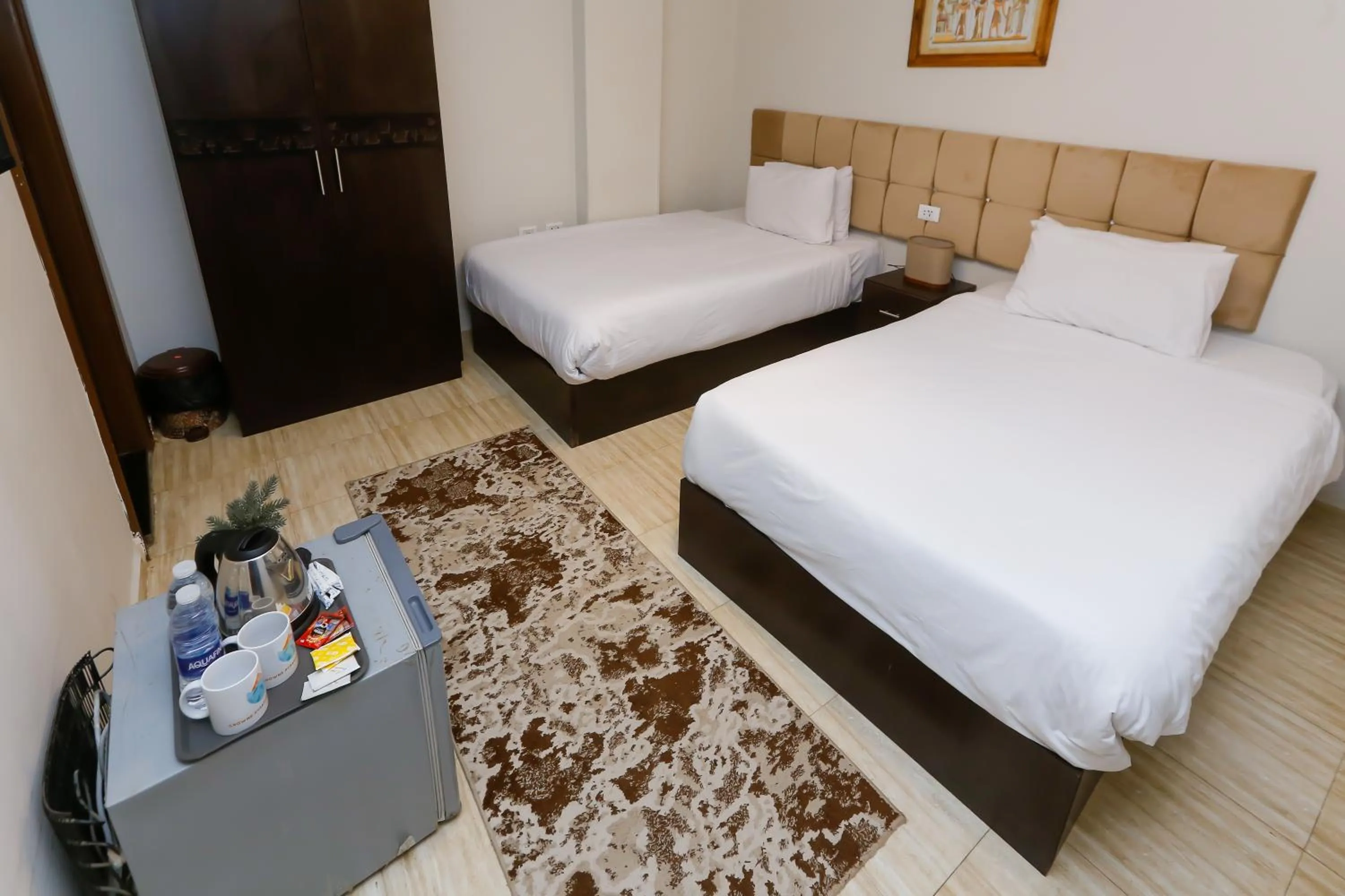 Bed in Crowne Pyramids View inn