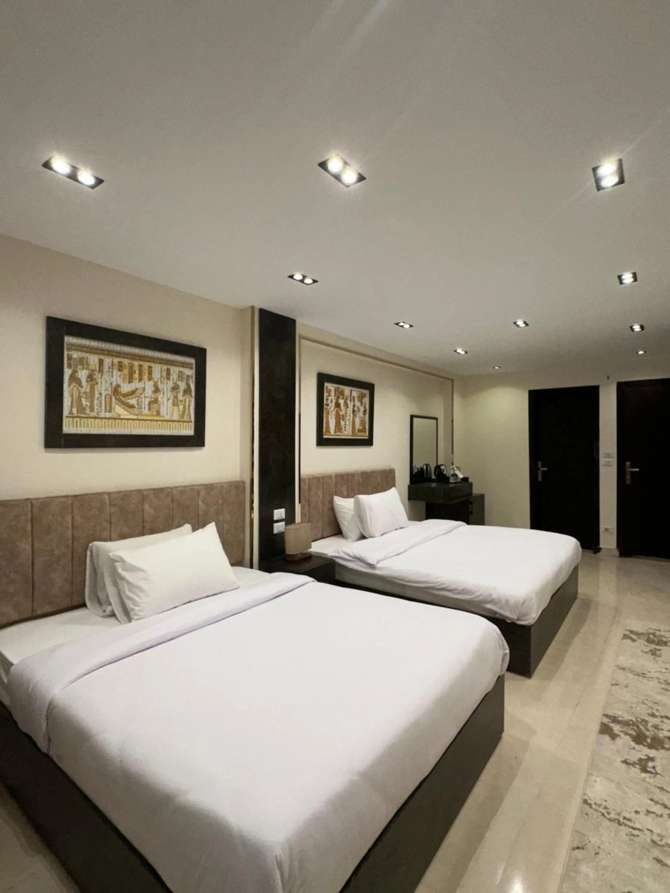 Bed in Crowne Pyramids View inn