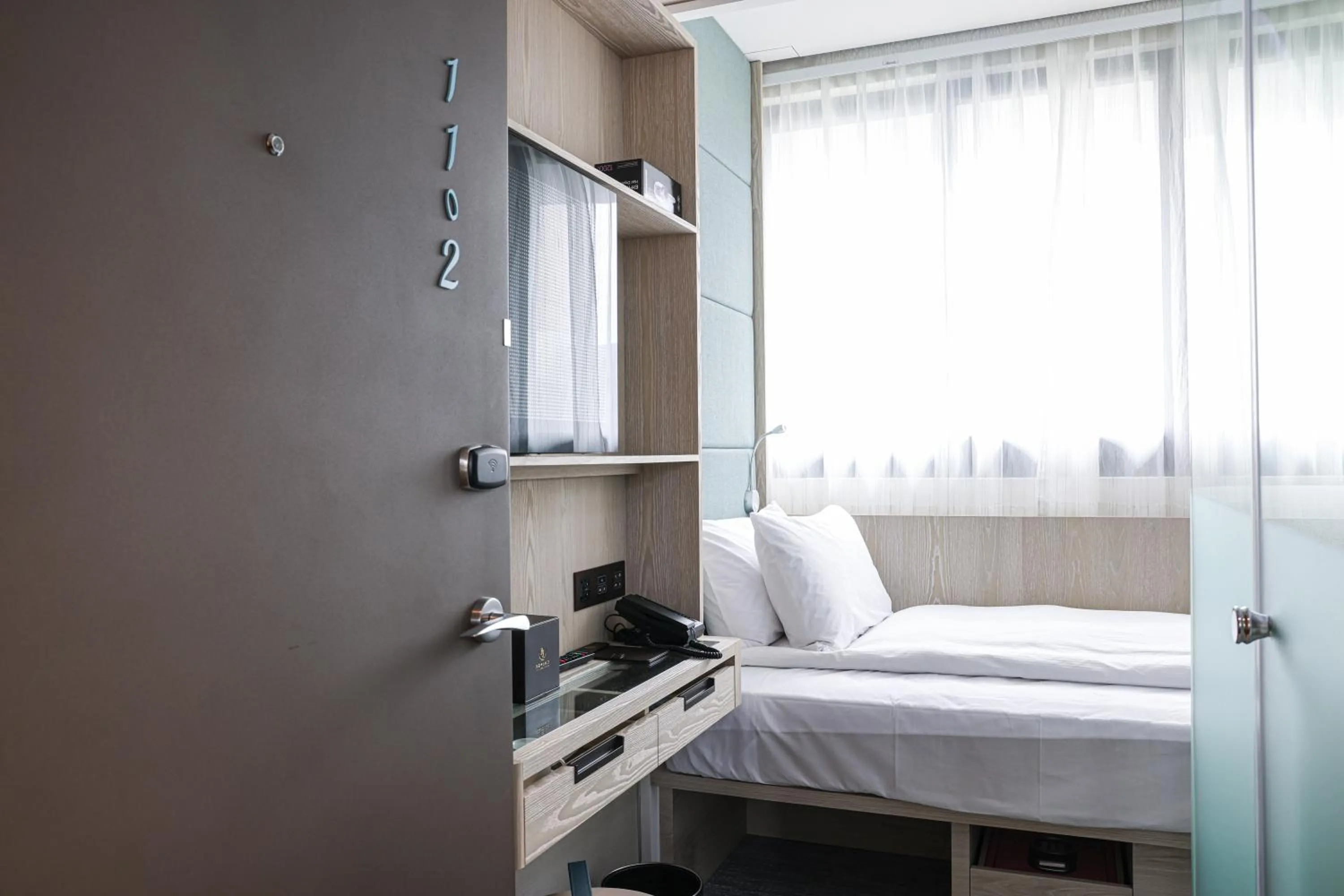 Bed in Royal Jade Boutique Hotel