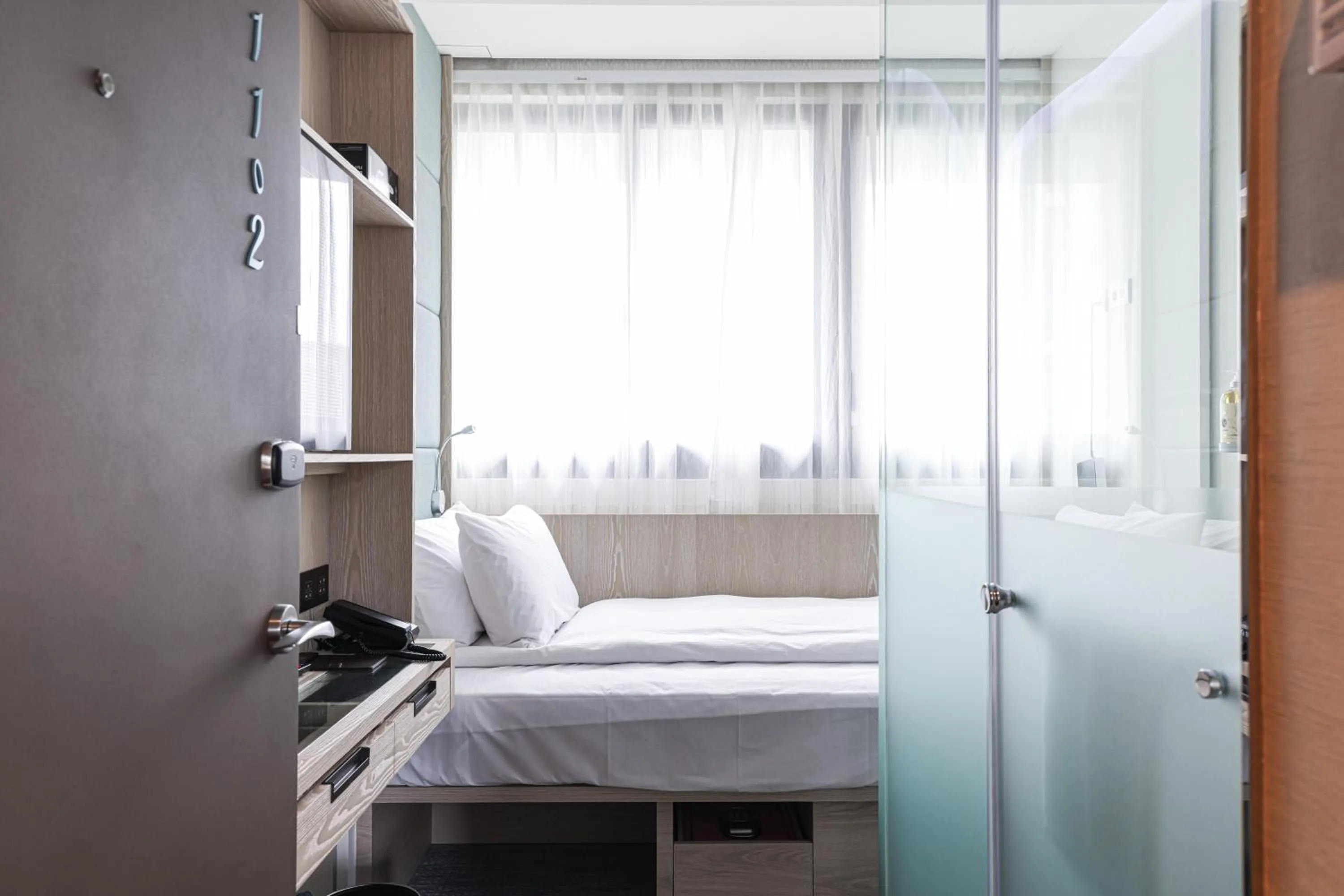 Bed in Royal Jade Boutique Hotel