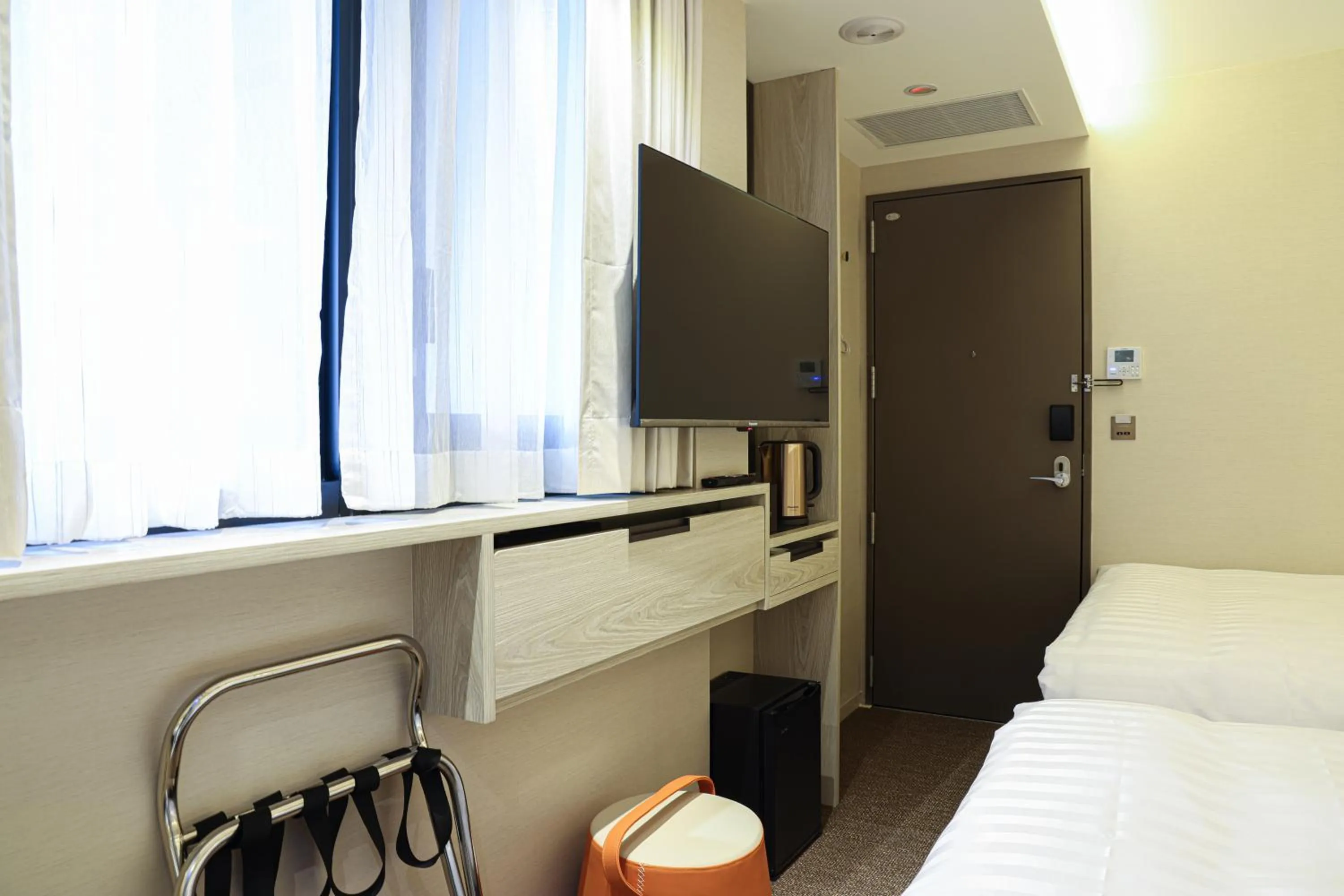 Bed in Royal Jade Boutique Hotel