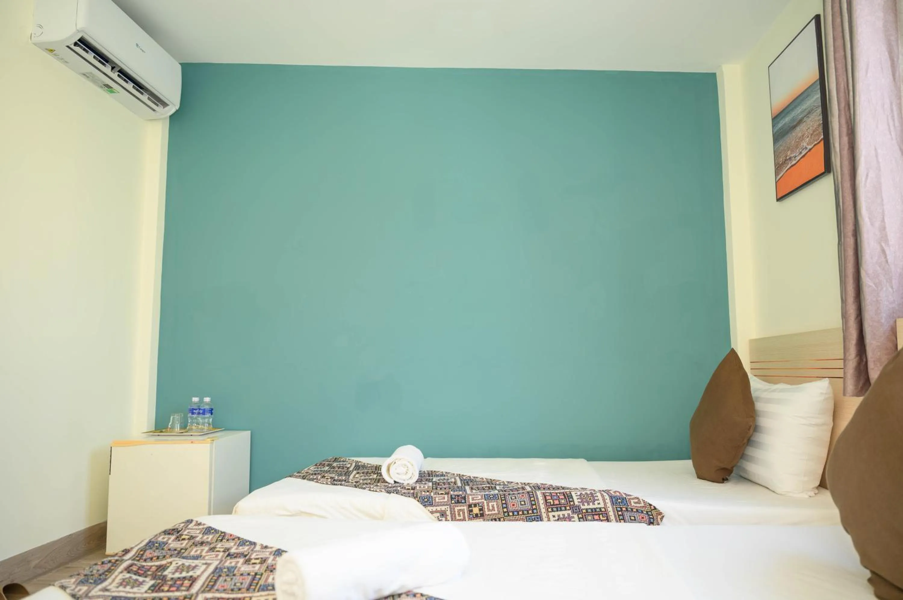 Bed in Jasmine Hotel