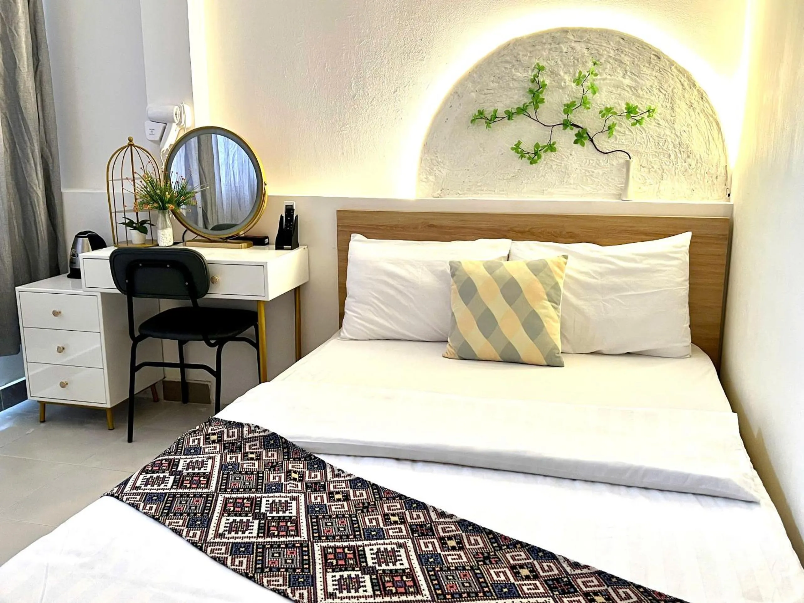 Bed in Jasmine Hotel