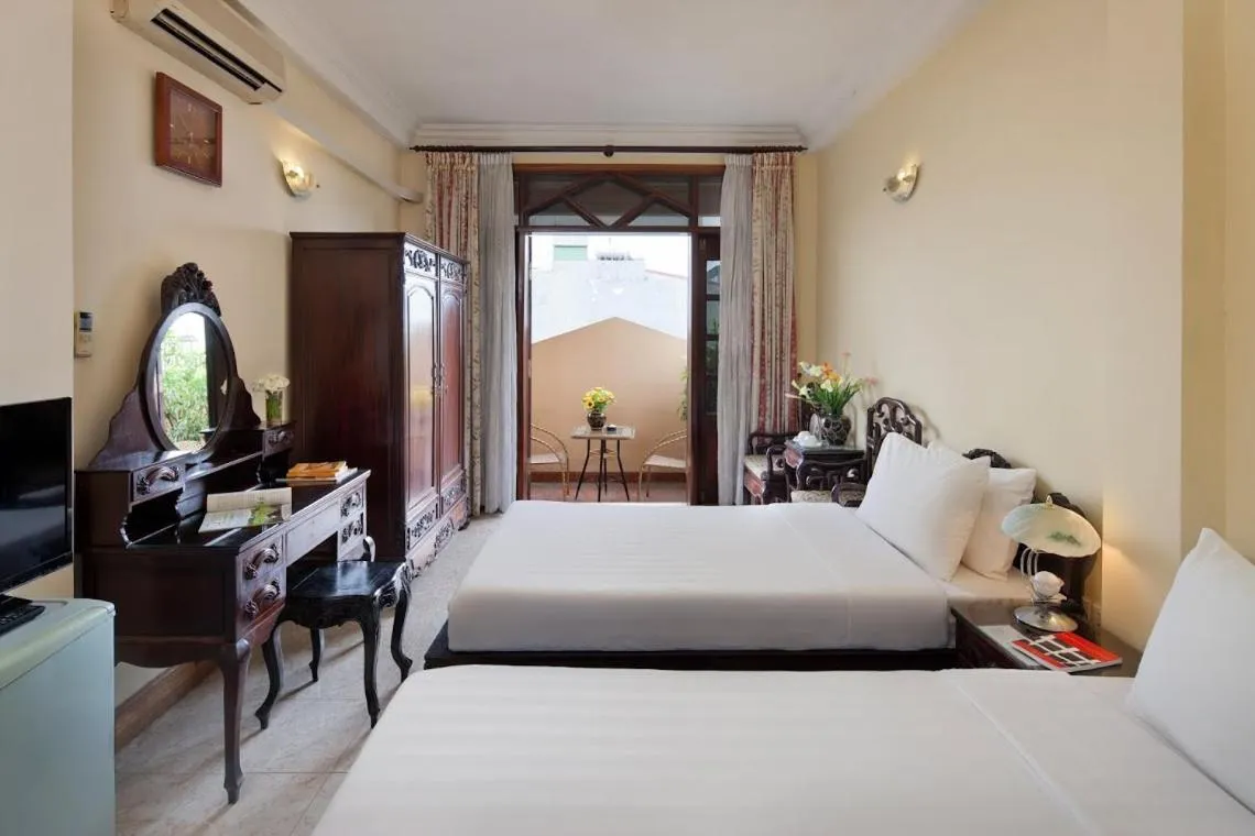 Photo of the whole room, Bed in Lucky Central Hotel & Travel