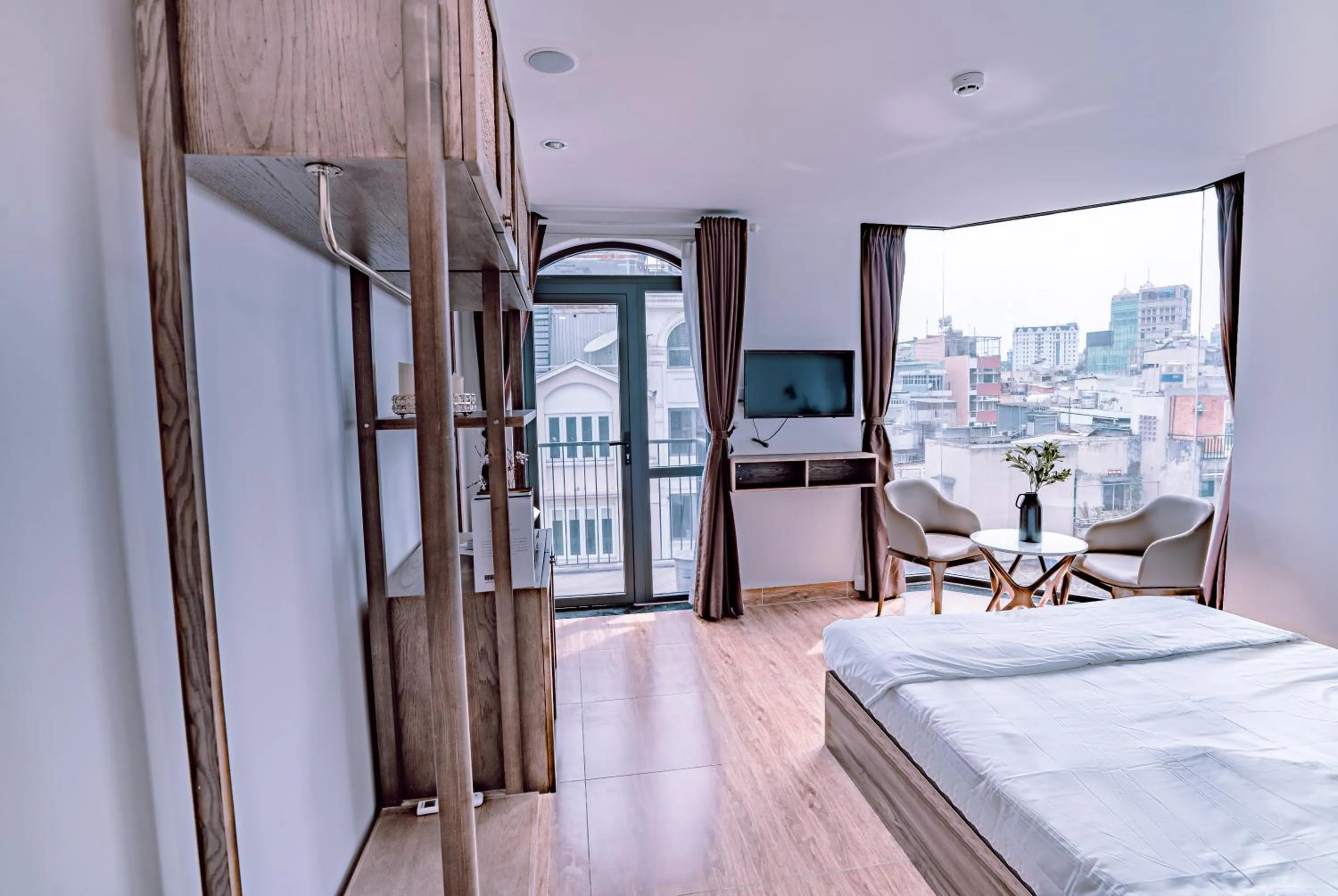 Photo of the whole room, Bed in Mint Hotel Bui Vien Q1