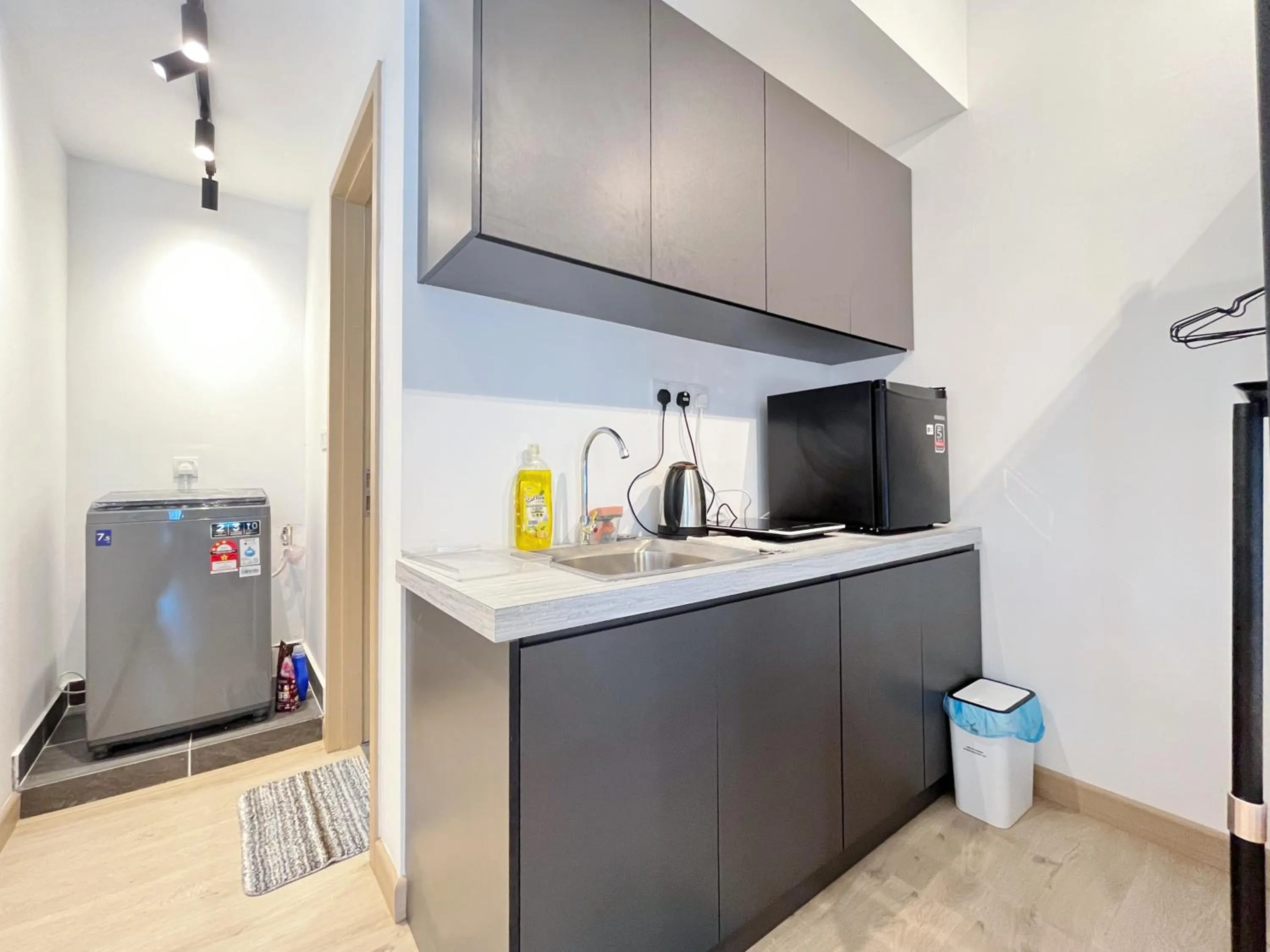 Kitchen or kitchenette in The Colony By Infinitum By Awesomestay