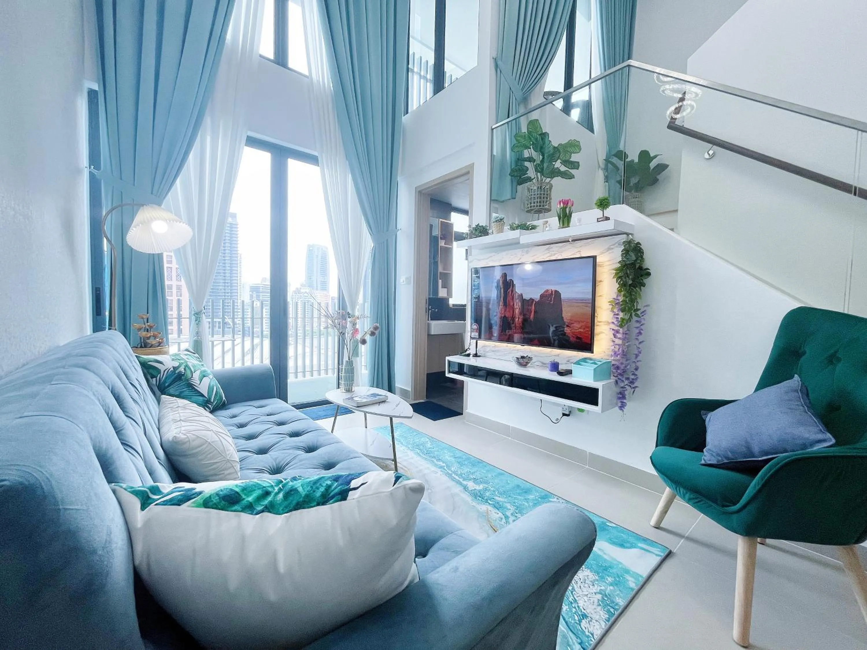 Communal lounge/ TV room in The Colony By Infinitum By Awesomestay