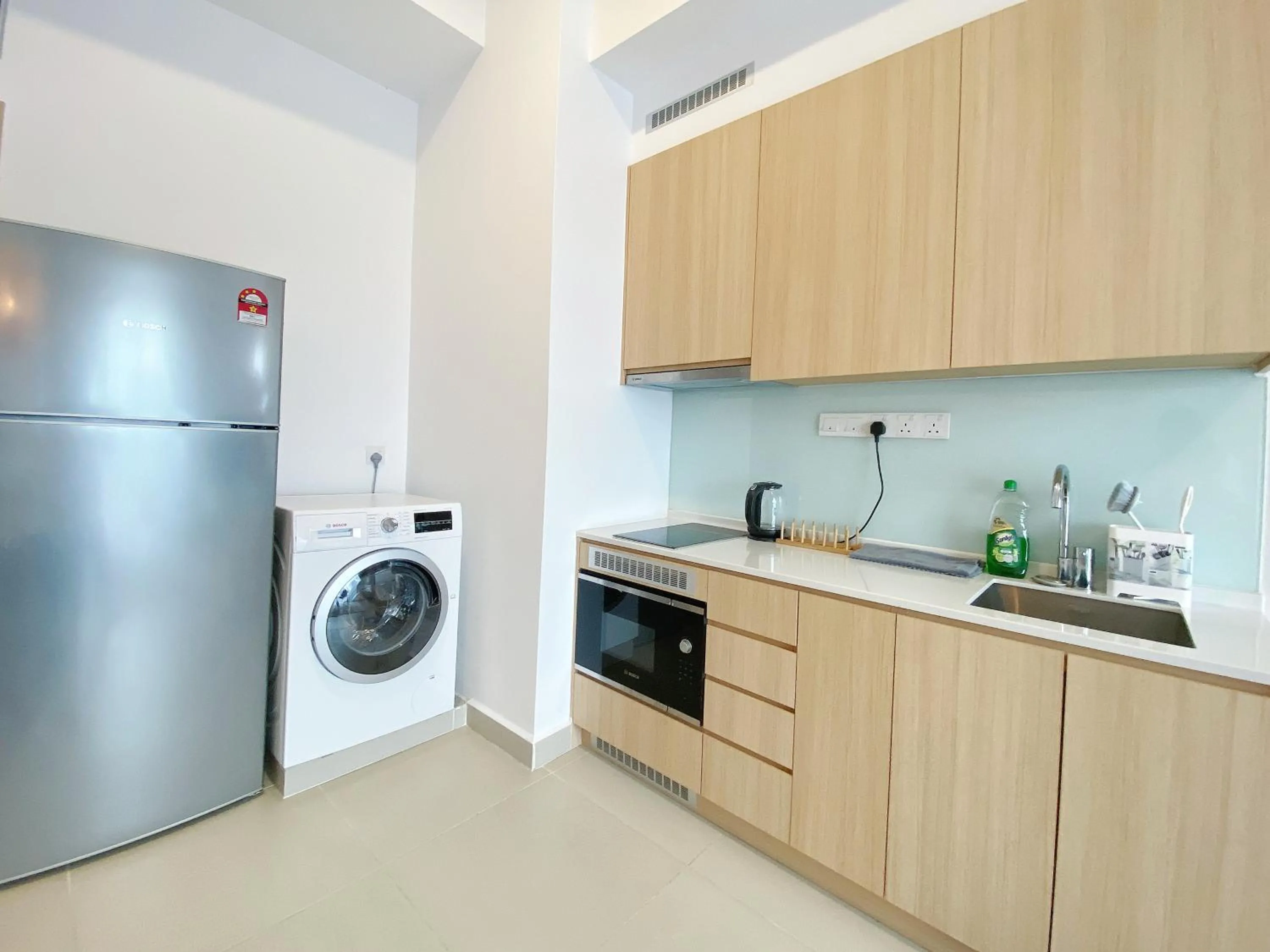 Kitchen or kitchenette in The Colony By Infinitum By Awesomestay