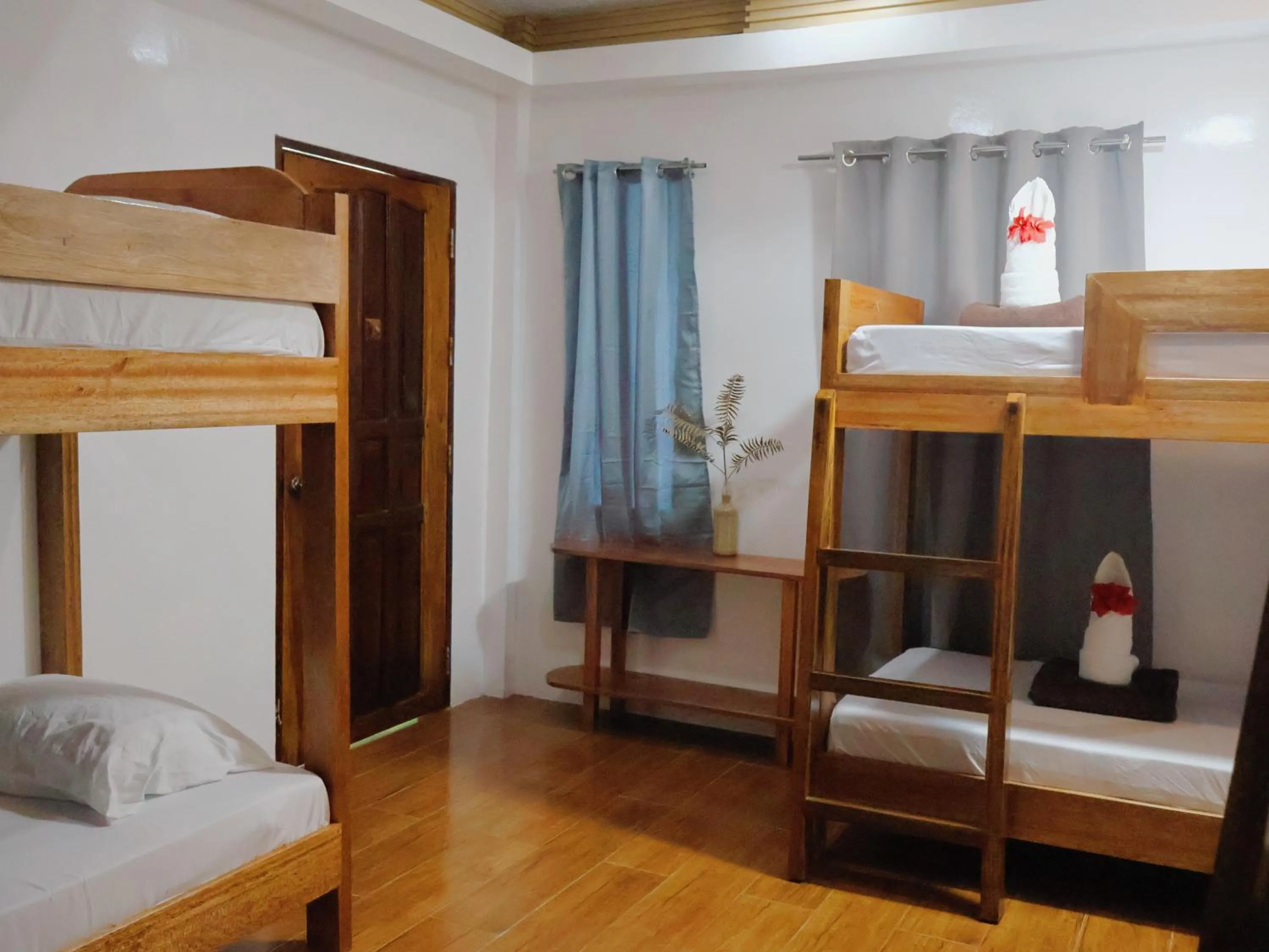 Bed in LANGOJON JIANJOY BEACH RESORT