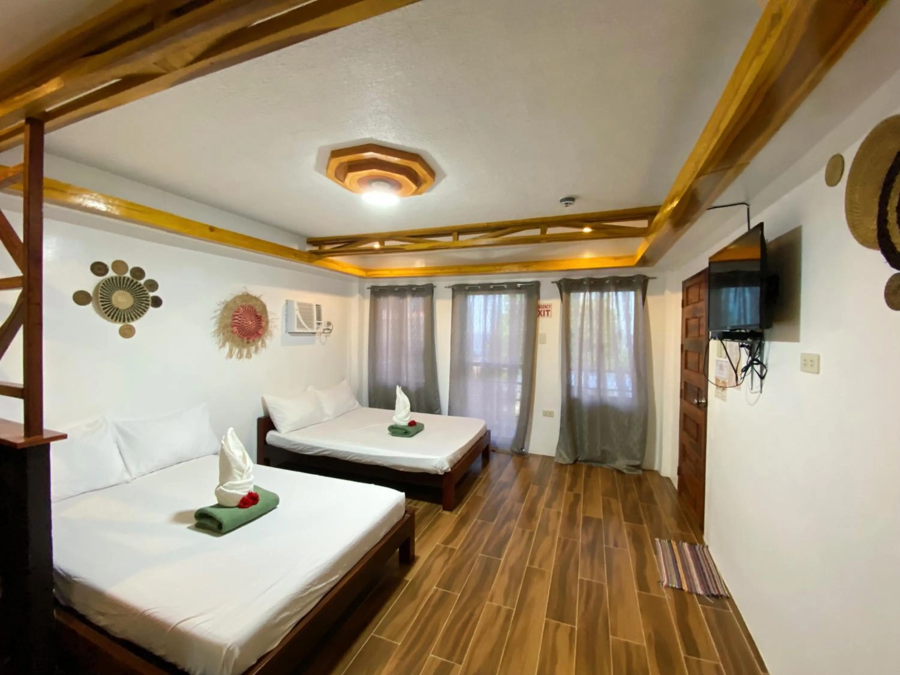 Bed in LANGOJON JIANJOY BEACH RESORT