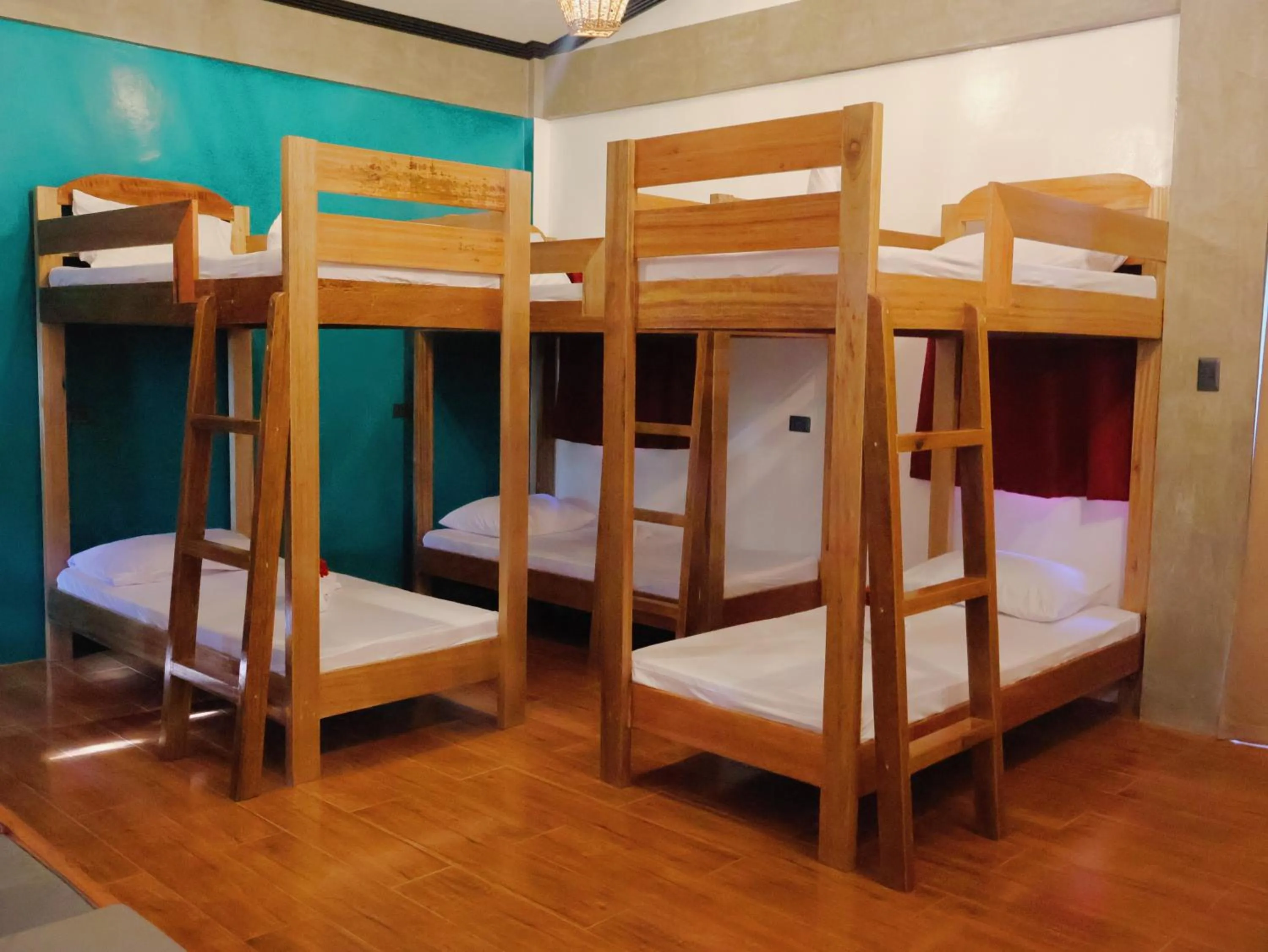 Bed in LANGOJON JIANJOY BEACH RESORT