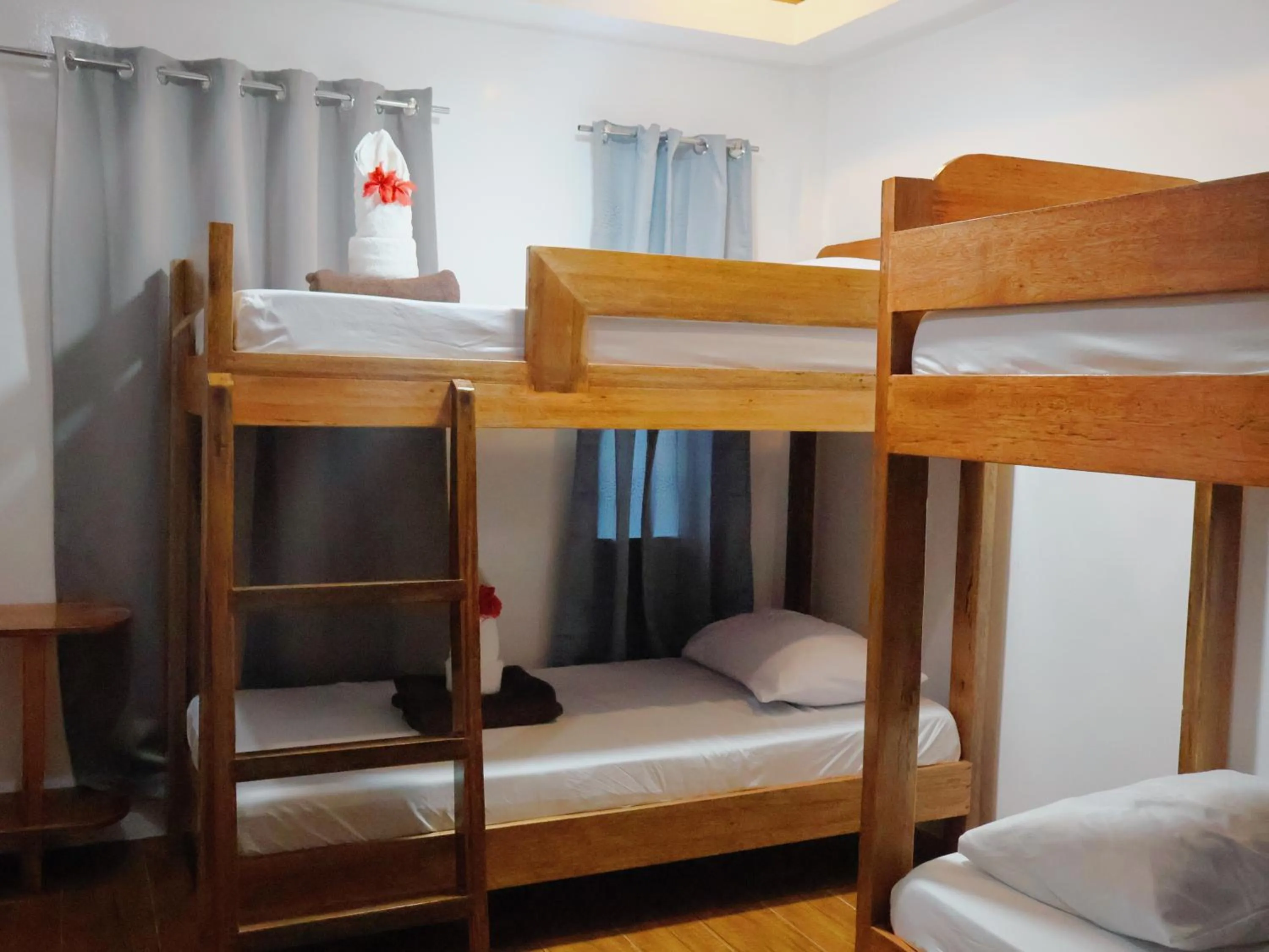 Bed in LANGOJON JIANJOY BEACH RESORT