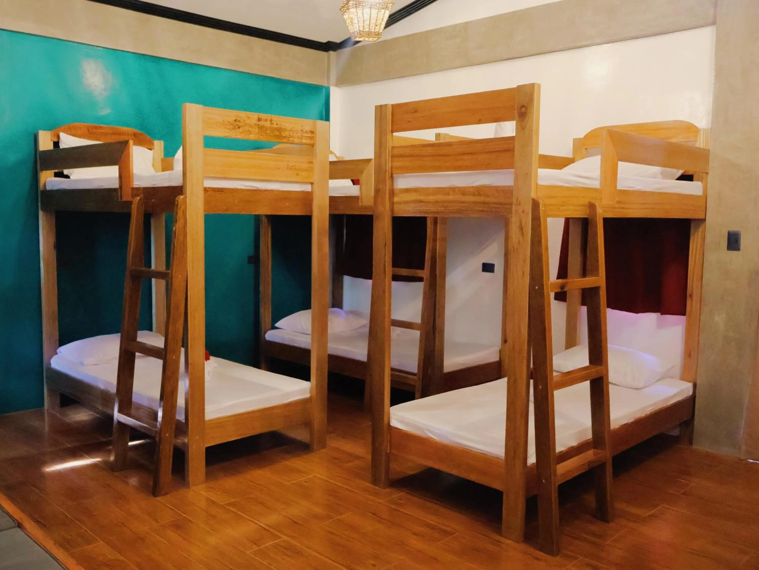 Bed in LANGOJON JIANJOY BEACH RESORT