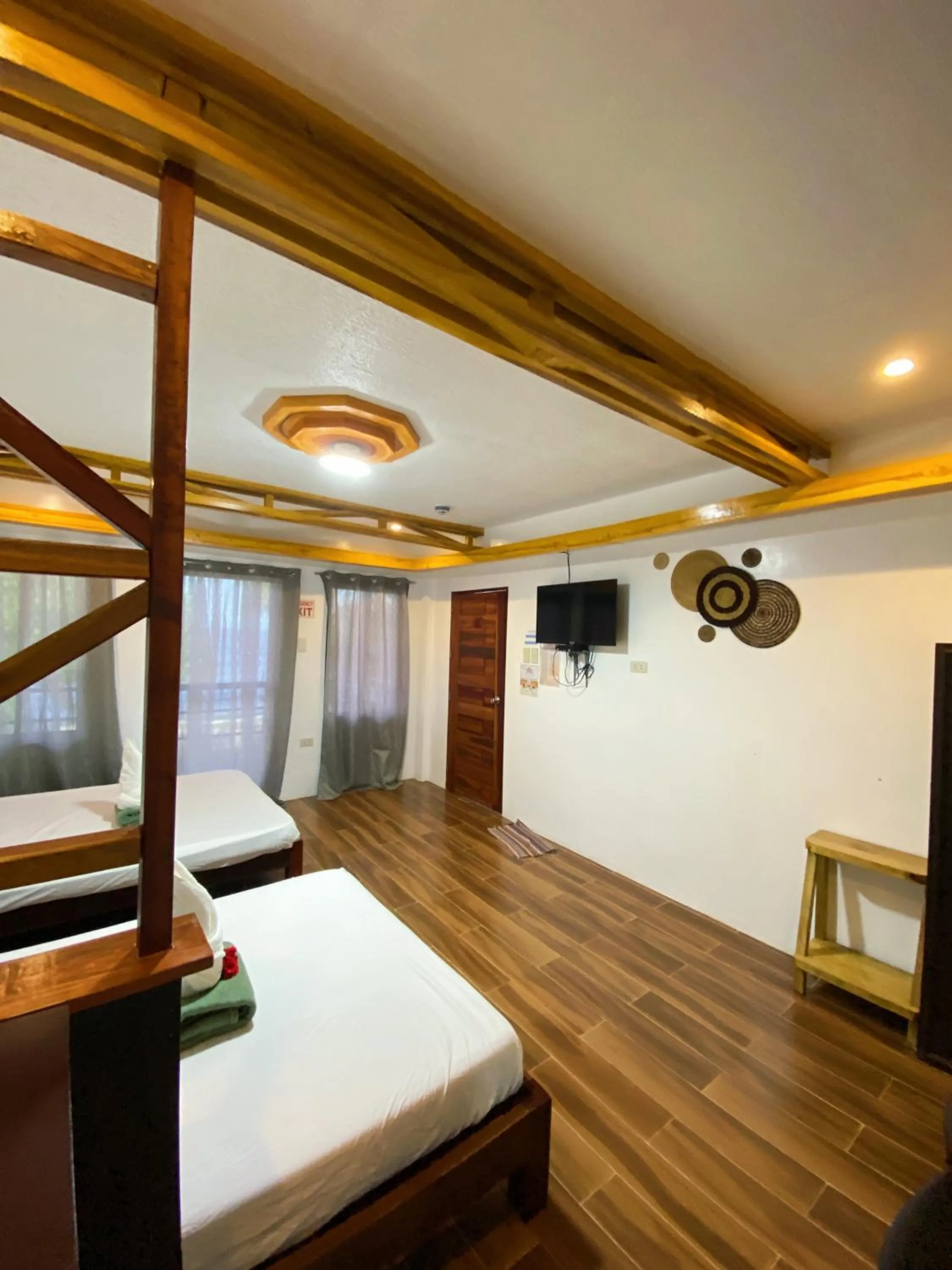 Bed in LANGOJON JIANJOY BEACH RESORT