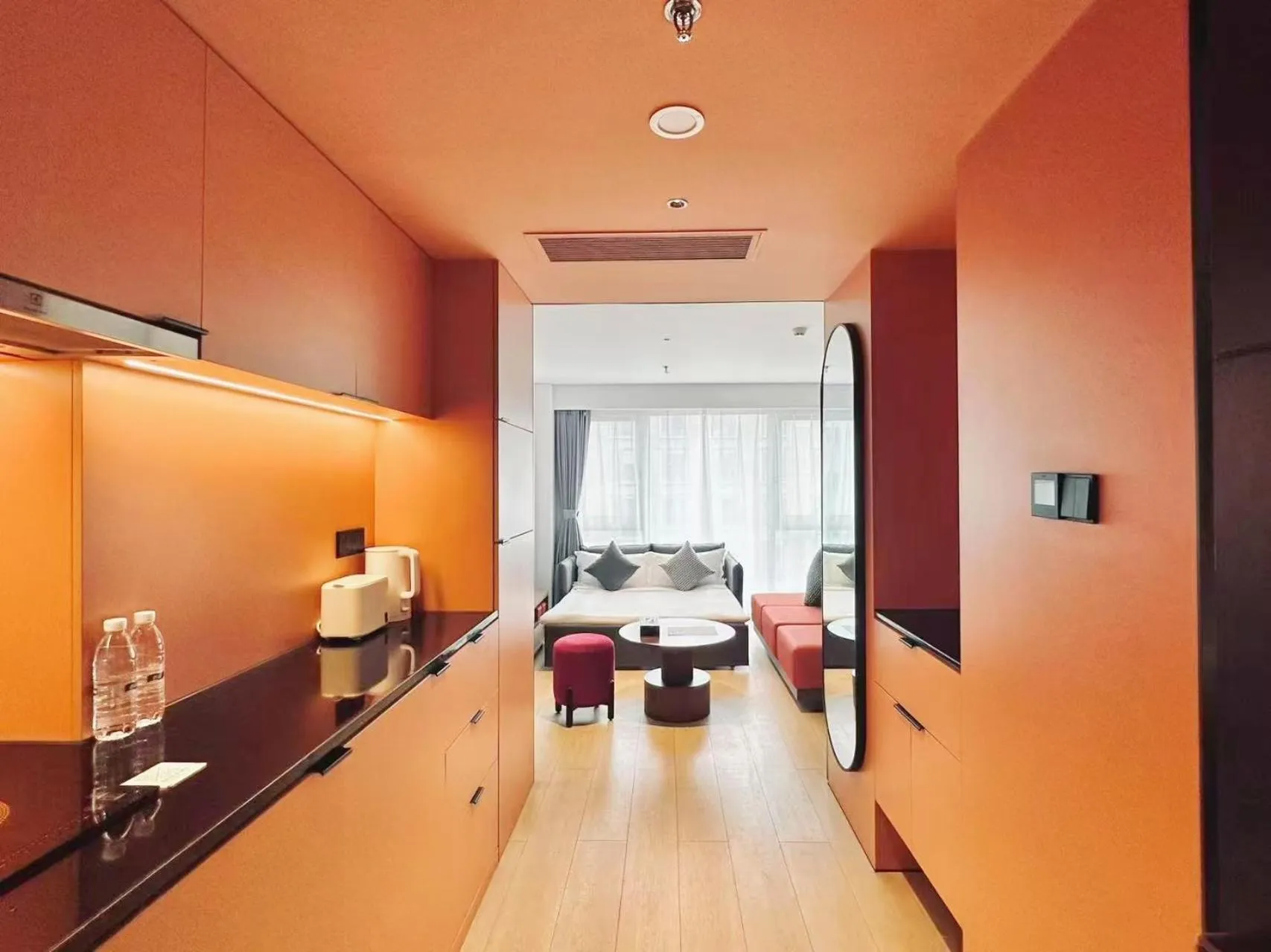 Living room in base-Beijing Wangfujing Serviced Apartment- in Hutong &Bike rental &Close to Forbidden City, Tian'anmen Square &Subway nearby &Free coffee &Washing machine,Kitchen &Restaurant discount &English speaking &High speed free WiFi