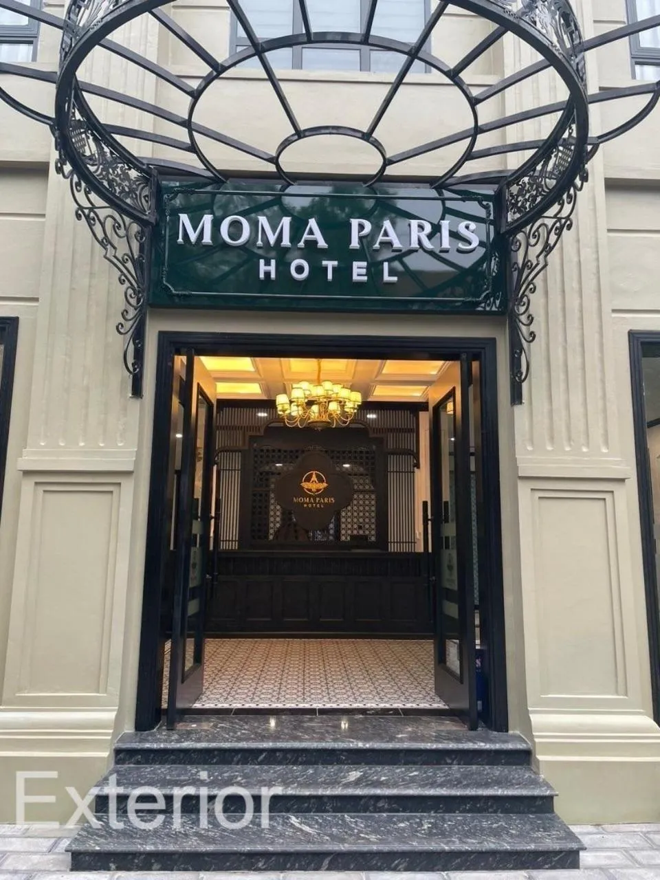 Property logo or sign in Moma Paris Hotel Ninh Bình