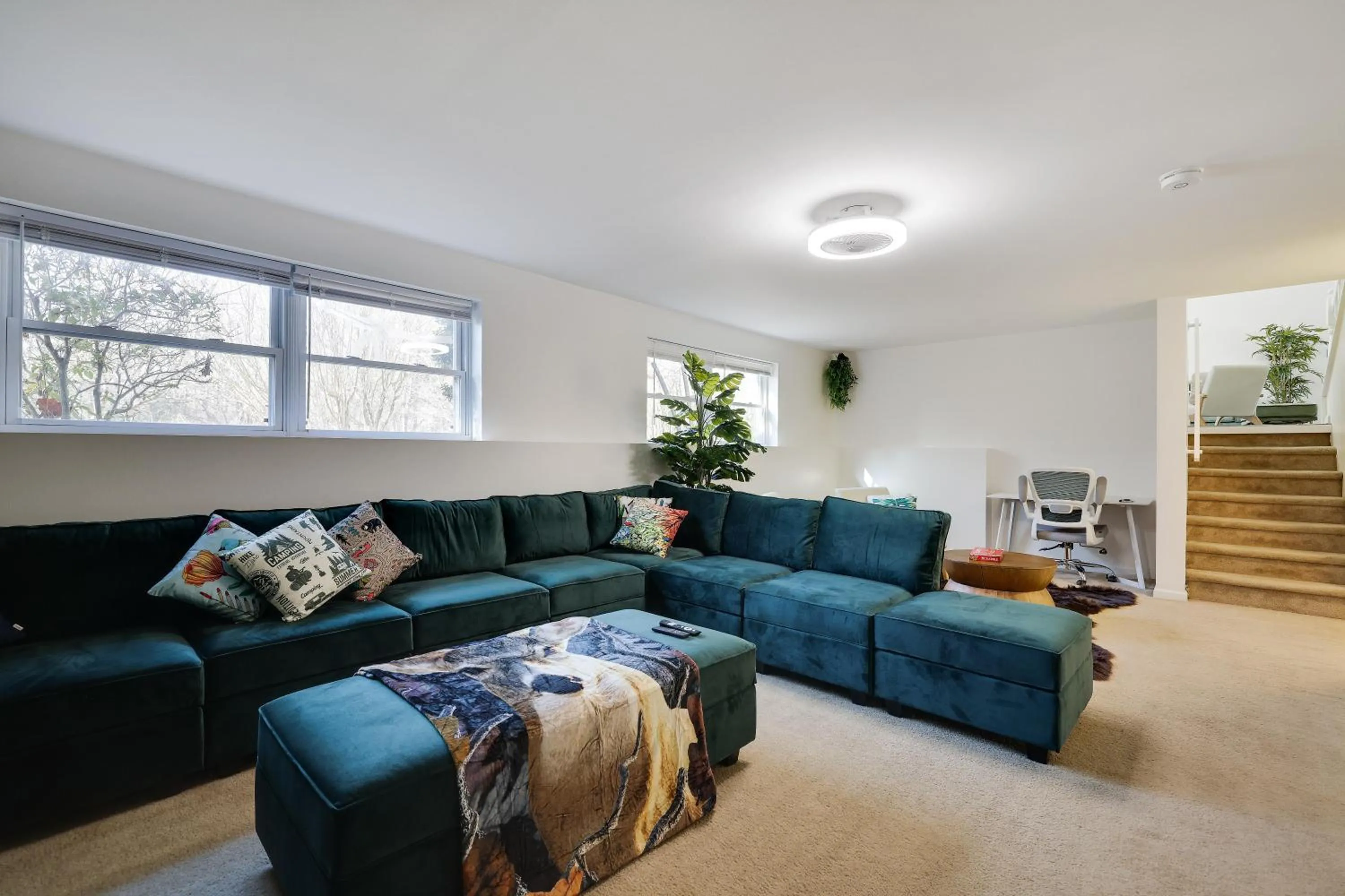 Living room in Stunning Poconos Villa- Hot Tub, Pool, Game Room, BBQ & more