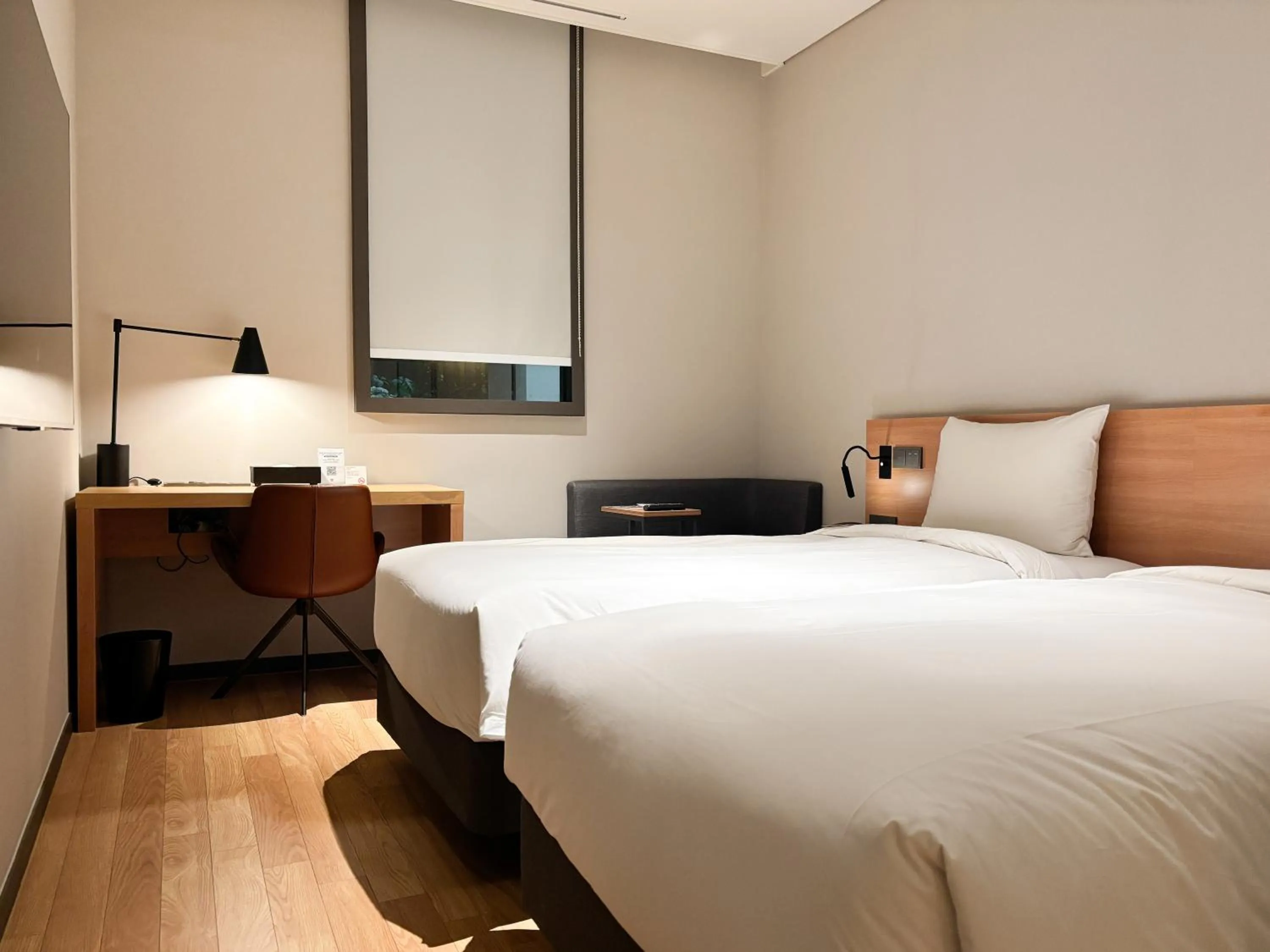 Bed in Ibis Ambassador Suwon
