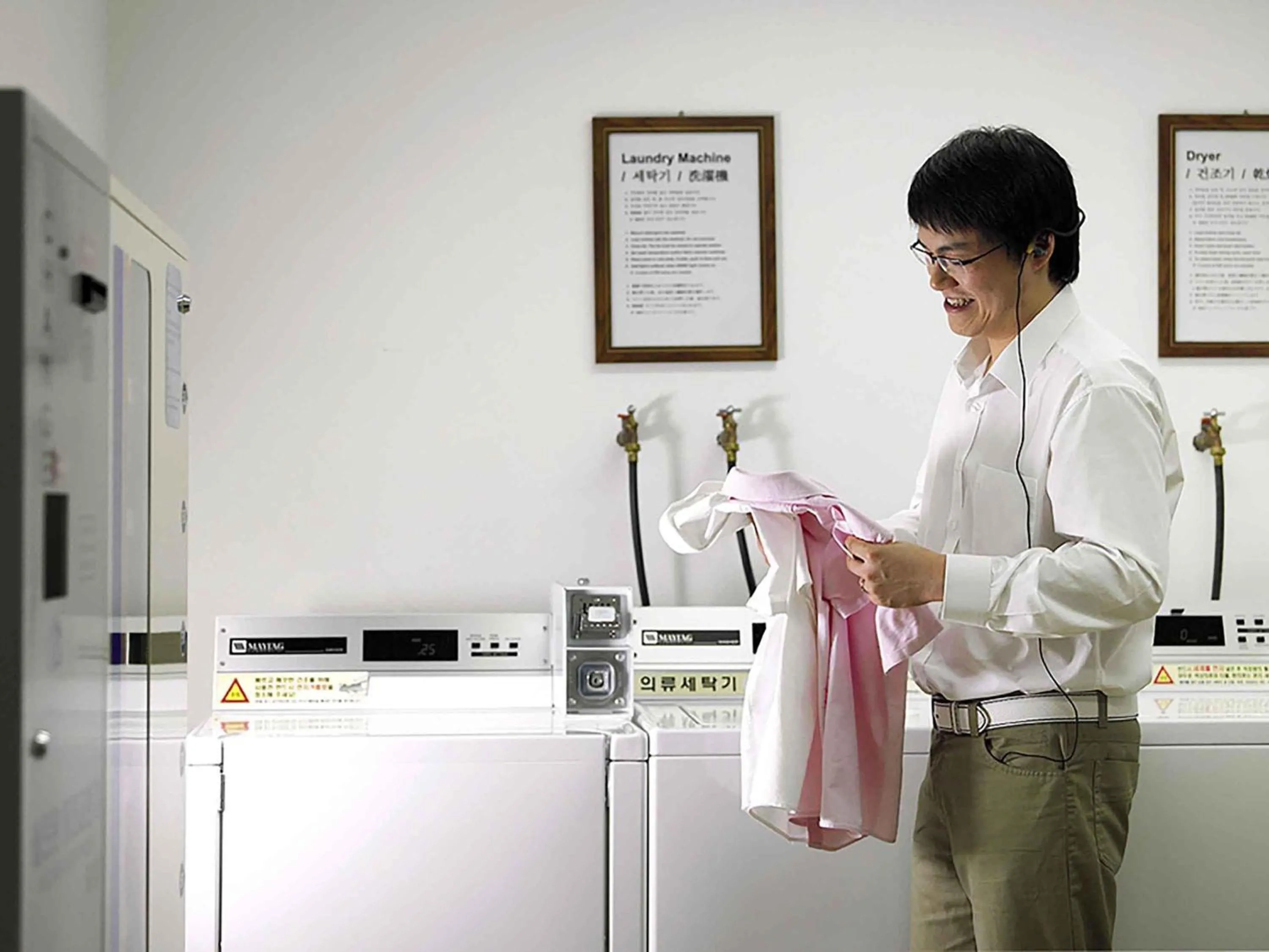 washing machine in Ibis Ambassador Suwon