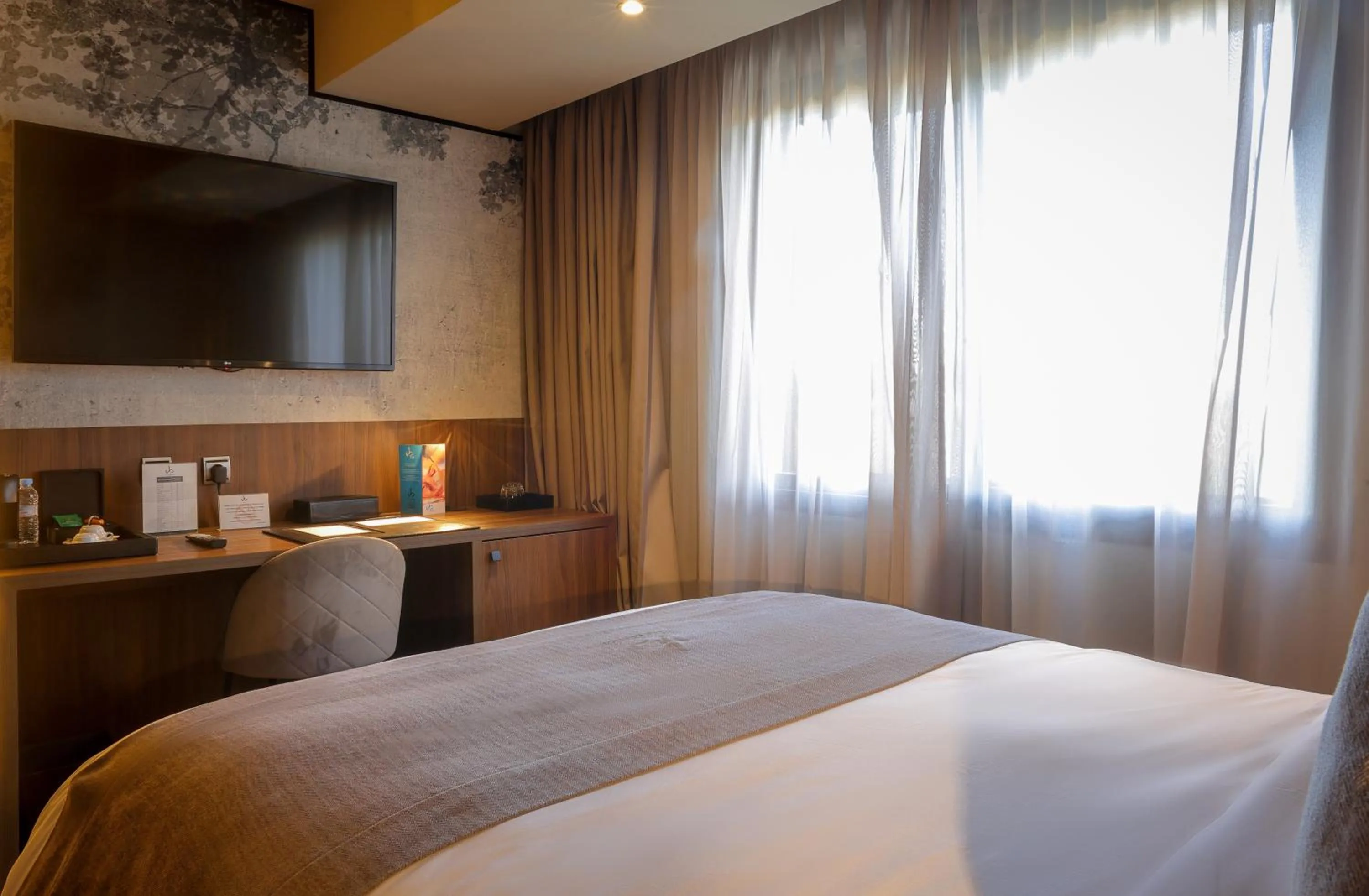 Bed in Villa Blanca Urban Hotel